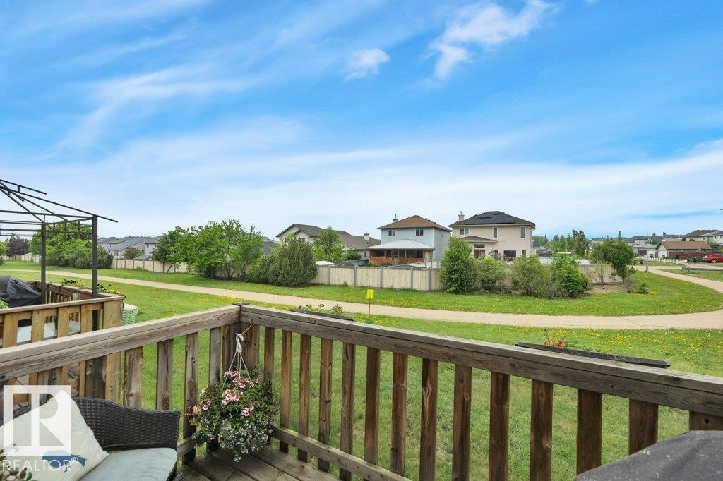 West facing onto lush green space - #10 15151 43 St Nw, Edmonton, AB - Outdoor With Deck Patio Veranda