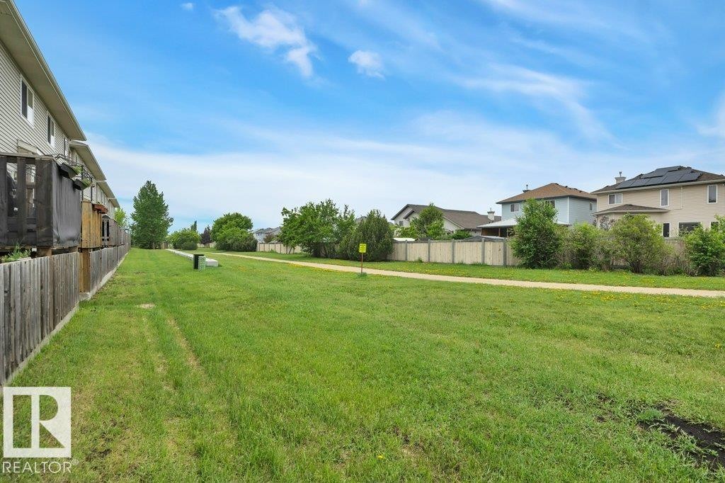 Behind the home, with walking path - #10 15151 43 St Nw, Edmonton, AB - Outdoor