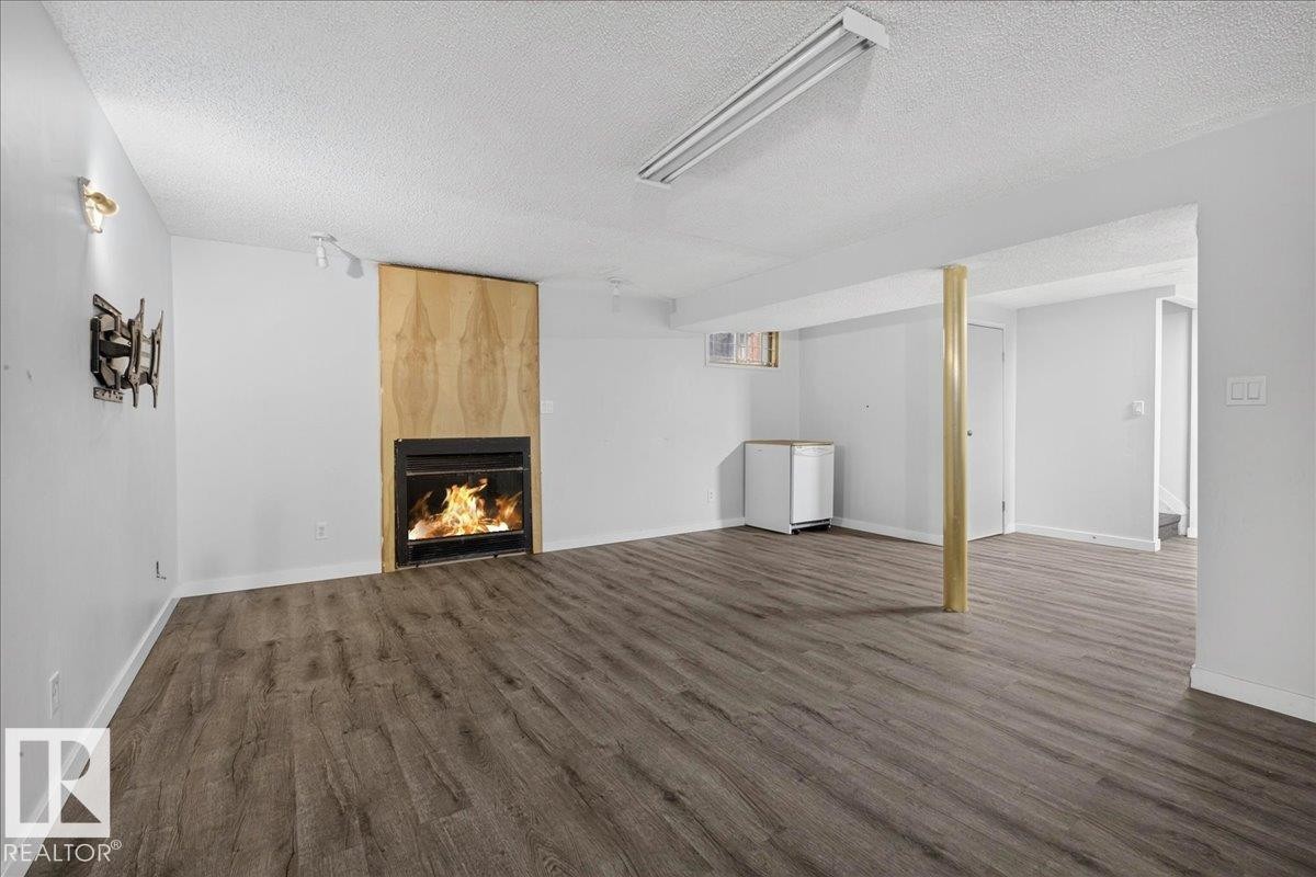 1939 61 Street Nw, Edmonton, AB - Indoor With Fireplace