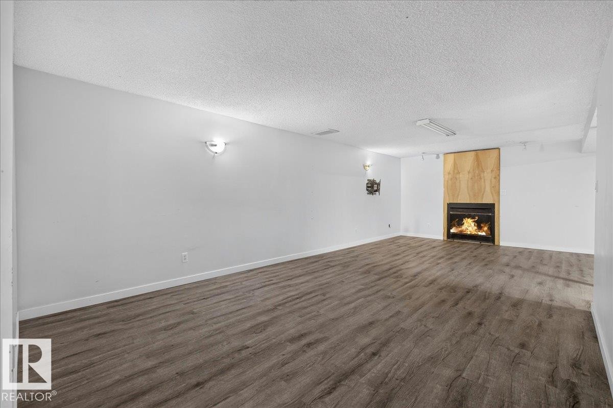 1939 61 Street Nw, Edmonton, AB - Indoor With Fireplace