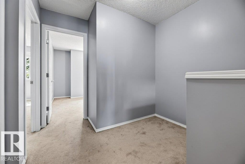 #7 8304 11 Av Sw, Edmonton, AB - Indoor Photo Showing Other Room