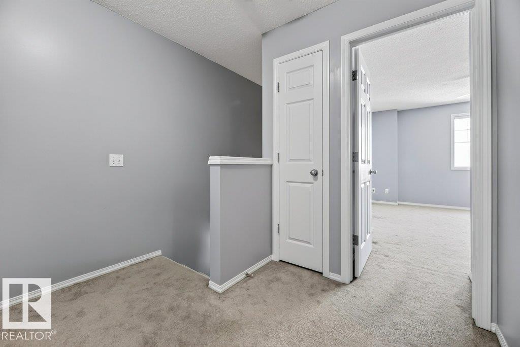 #7 8304 11 Av Sw, Edmonton, AB - Indoor Photo Showing Other Room
