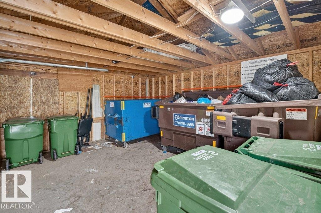 Garbage area for the complex. - #10 2816 34 Av Nw, Edmonton, AB - Indoor