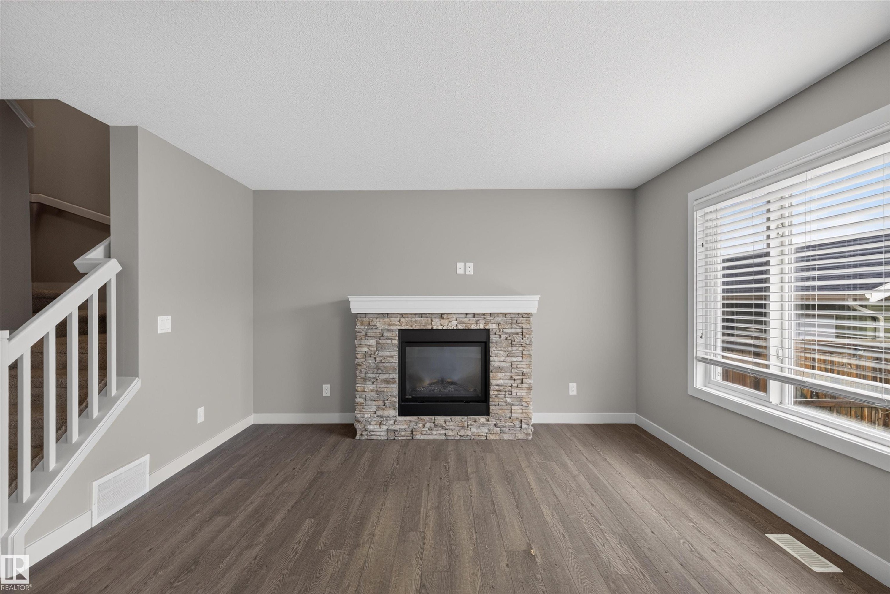 1107 162 Street Sw, Edmonton, AB - Indoor Photo Showing Living Room With Fireplace