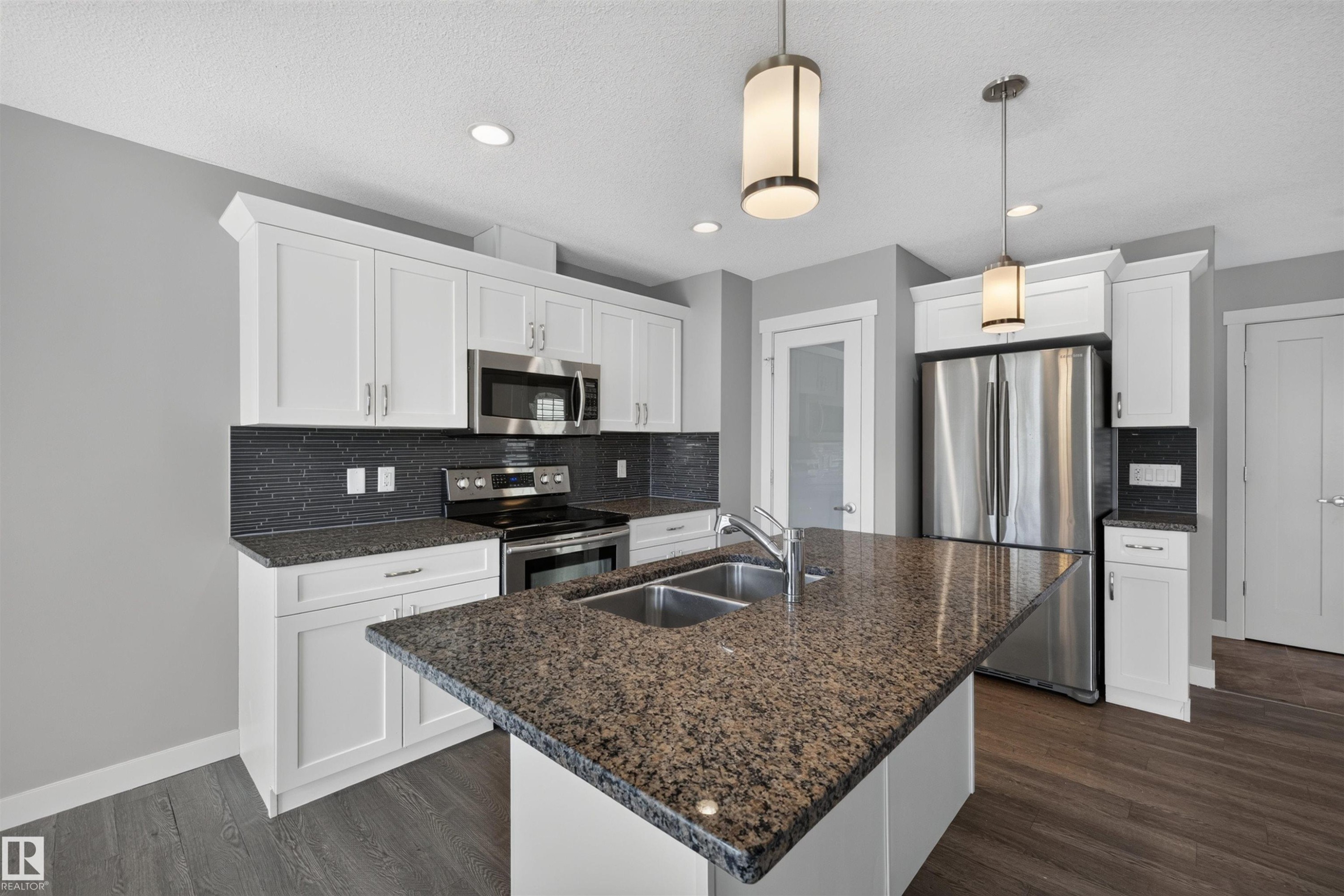 1107 162 Street Sw, Edmonton, AB - Indoor Photo Showing Kitchen With Double Sink With Upgraded Kitchen