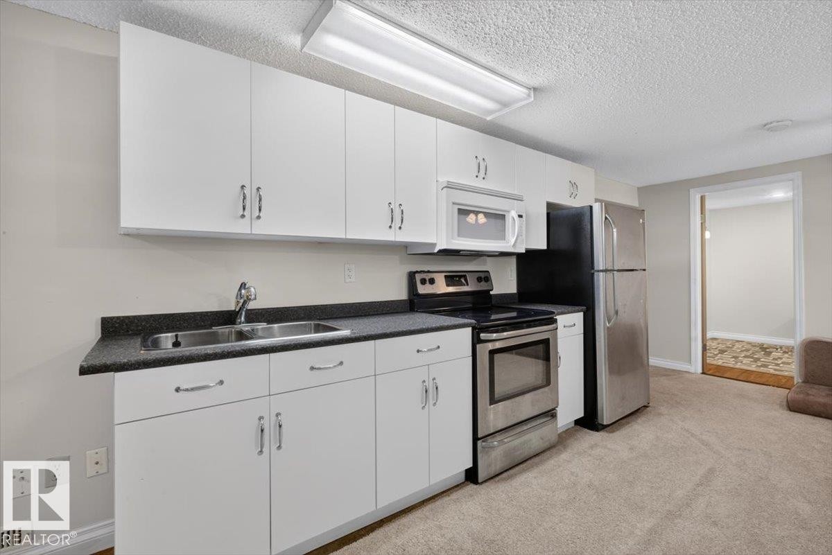 14735 123 Street Nw, Edmonton, AB - Indoor Photo Showing Kitchen With Double Sink
