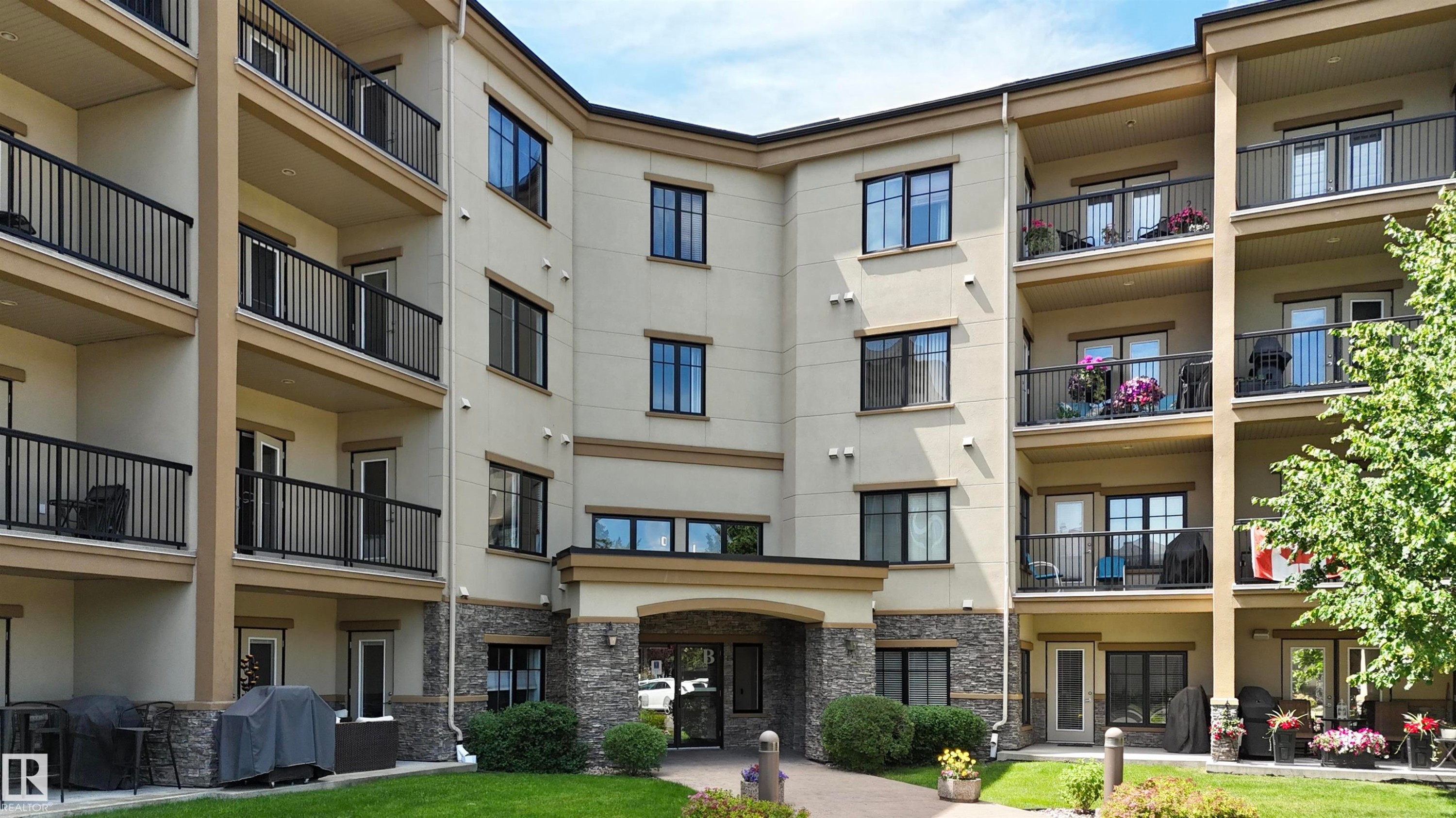 #106 160 Magrath Rd Nw, Edmonton, AB - Outdoor With Facade