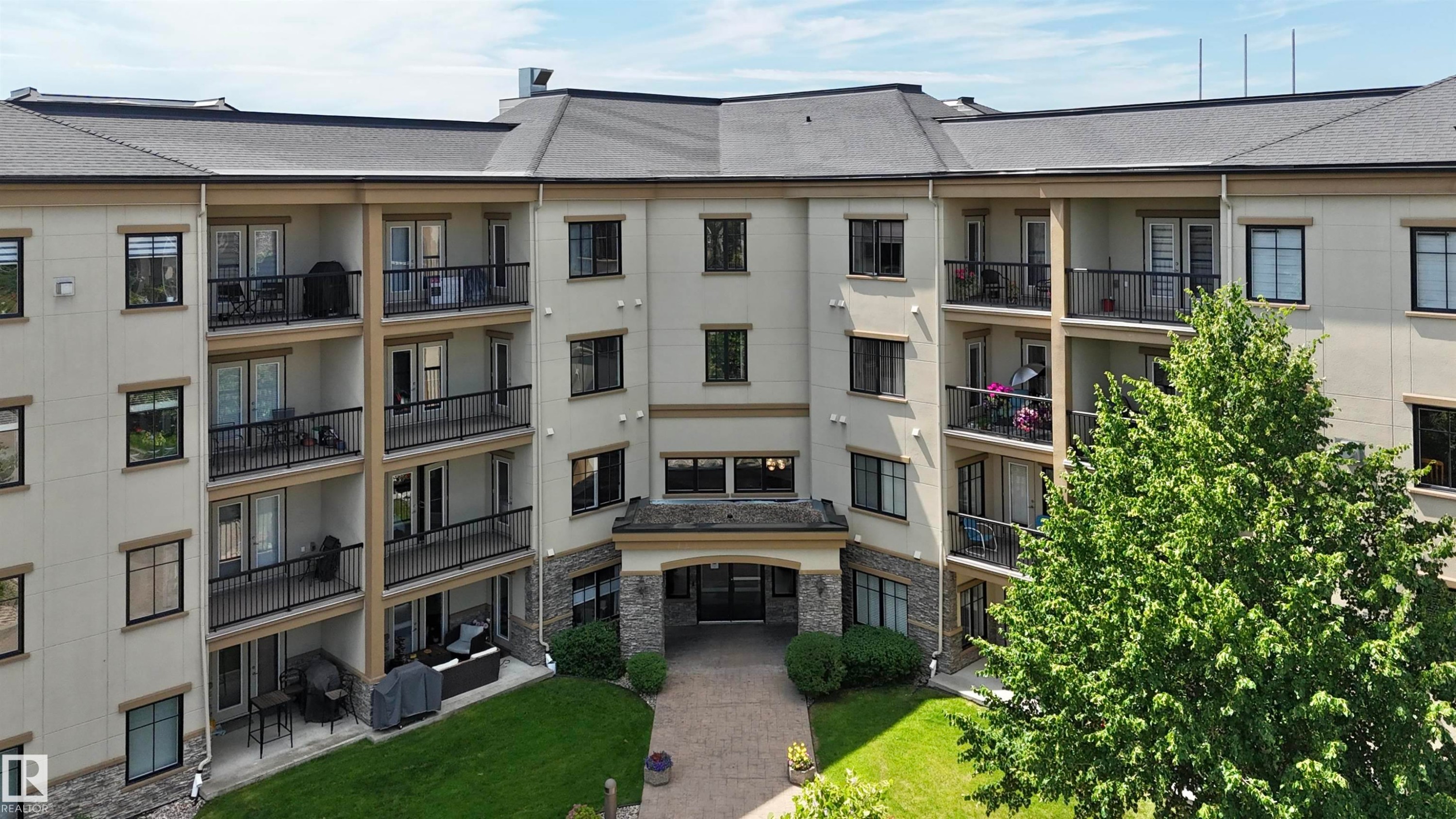 #106 160 Magrath Rd Nw, Edmonton, AB - Outdoor With Facade