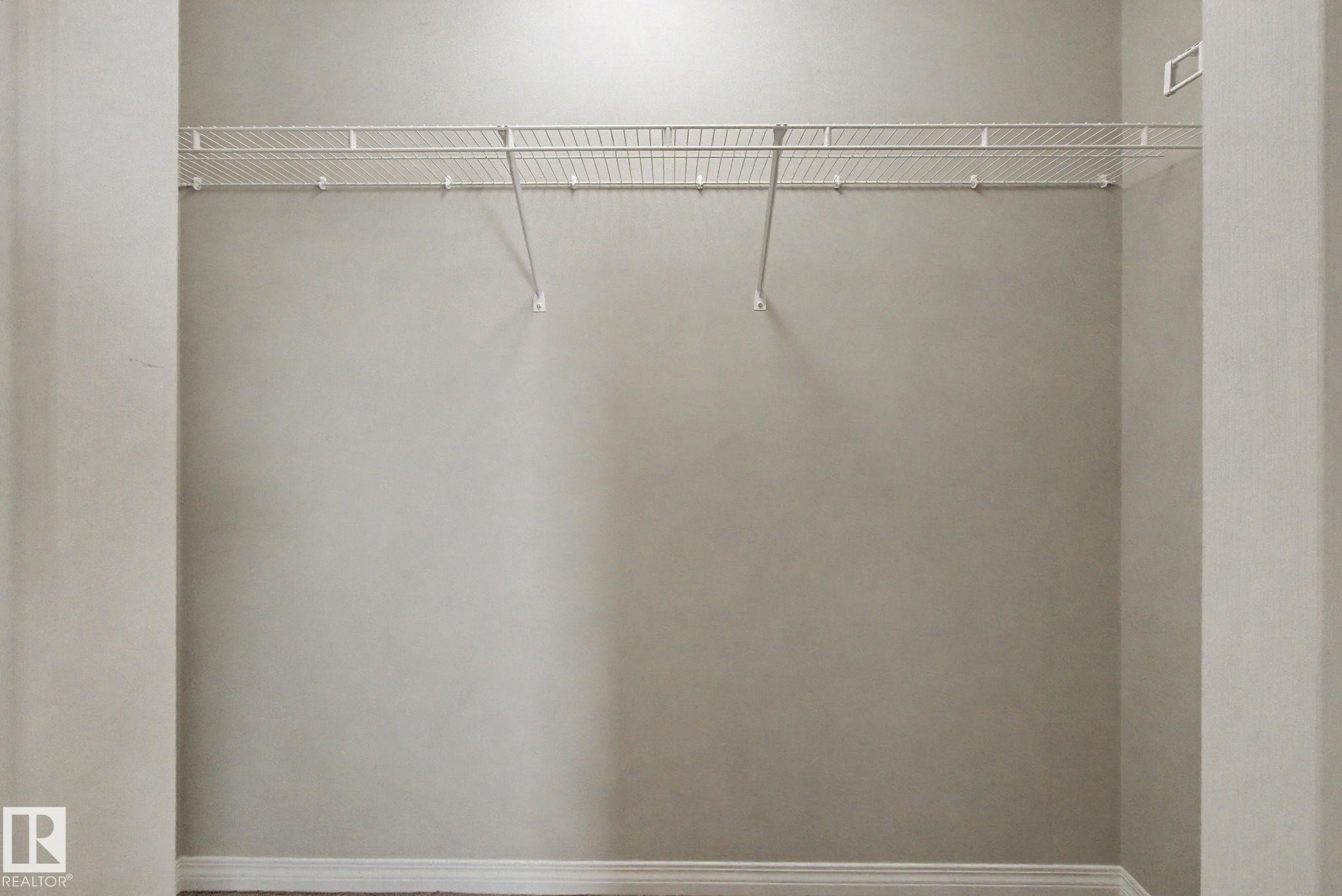 Closet space featuring a wire shelving system and a neutral wall color - 315 Watt Boulevard Sw, Edmonton, AB - Indoor With Storage
