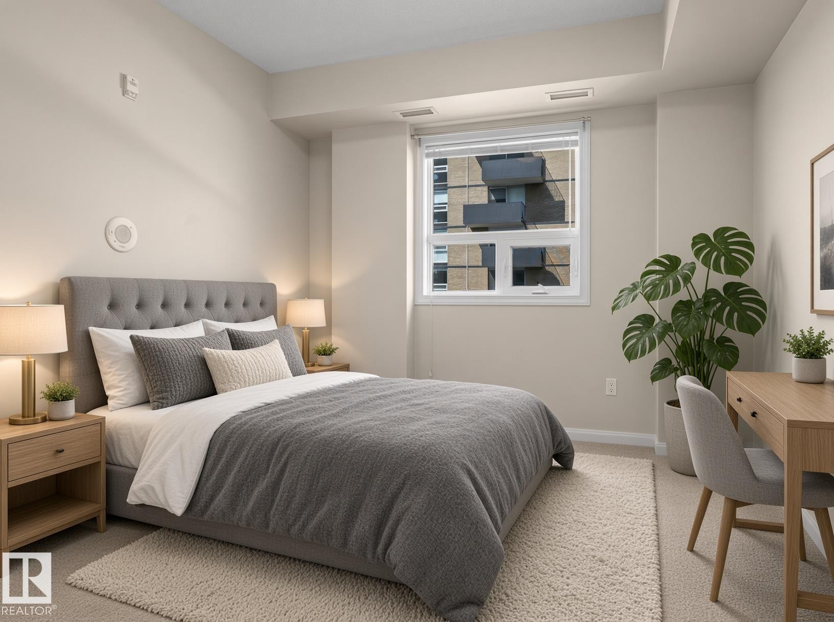 Wall-to-wall carpeting with a tufted headboard, recessed window with blinds, and built-in ceiling lighting - #707 9819 104 St Nw, Edmonton, AB
