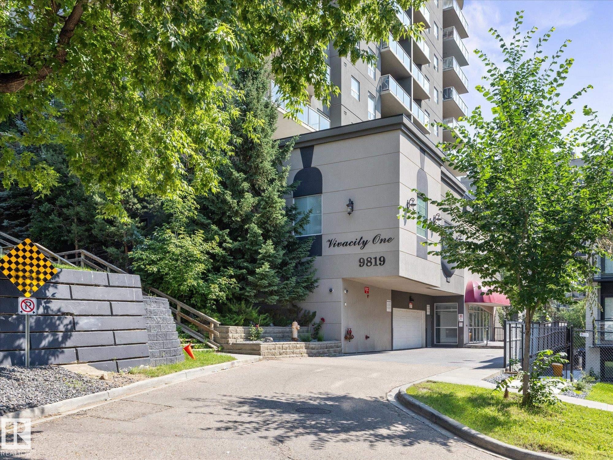 Contemporary building exterior with a multi-level design - #707 9819 104 St Nw, Edmonton, AB