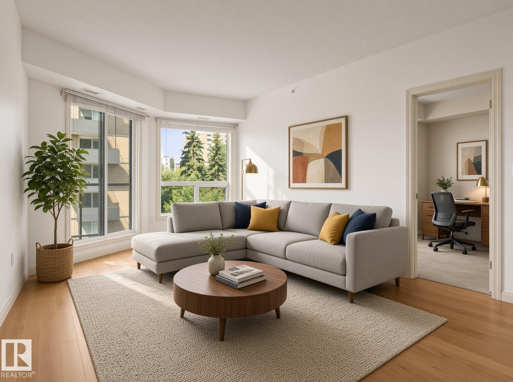 Hardwood-finish flooring, expansive windows, recessed lighting, and a doorway opening to an additional room - #707 9819 104 St Nw, Edmonton, AB