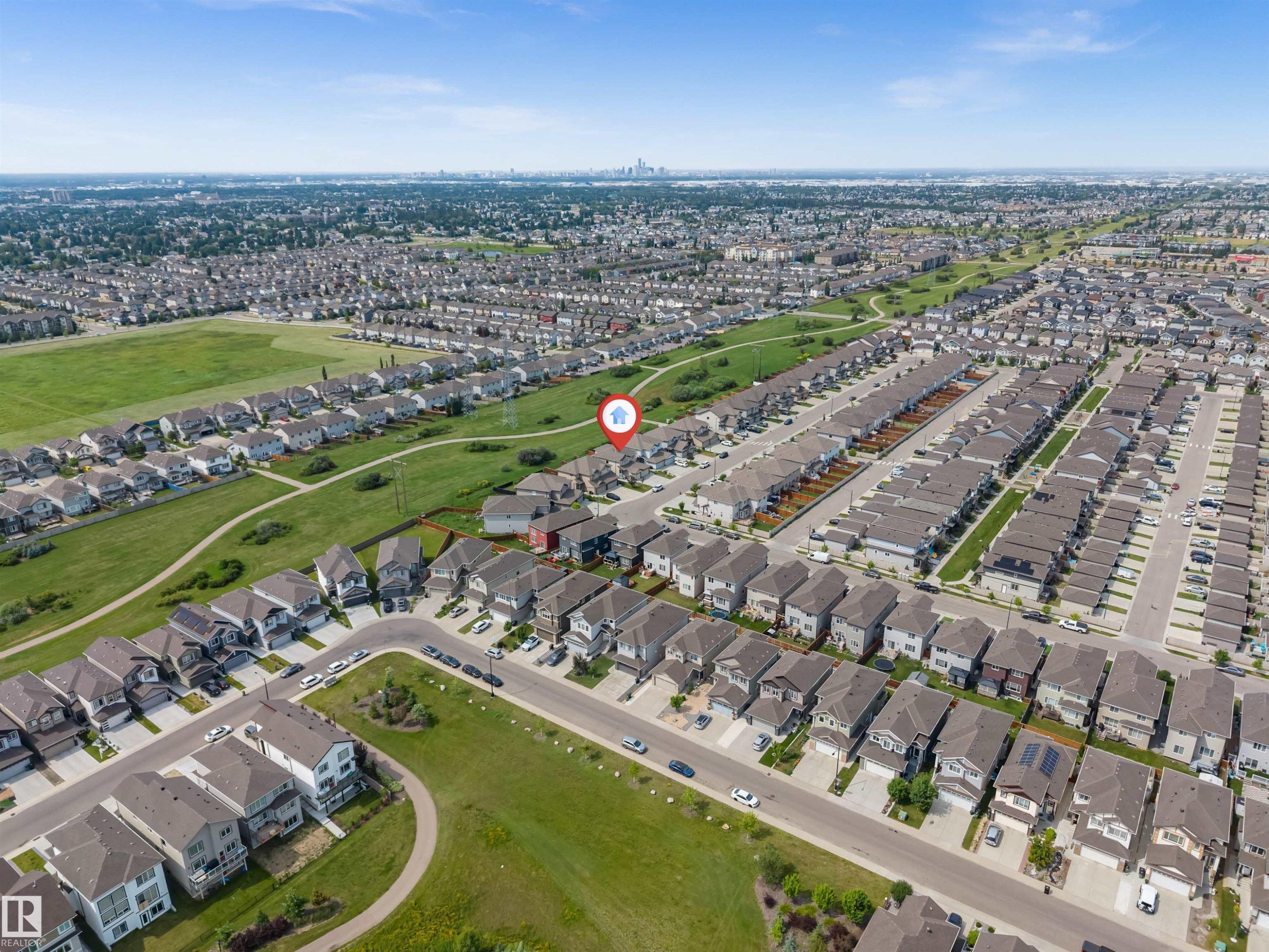 Aerial perspective of a residential neighborhood featuring numerous detached and attached homes - 1712 27 St Nw, Edmonton, AB - Outdoor With View