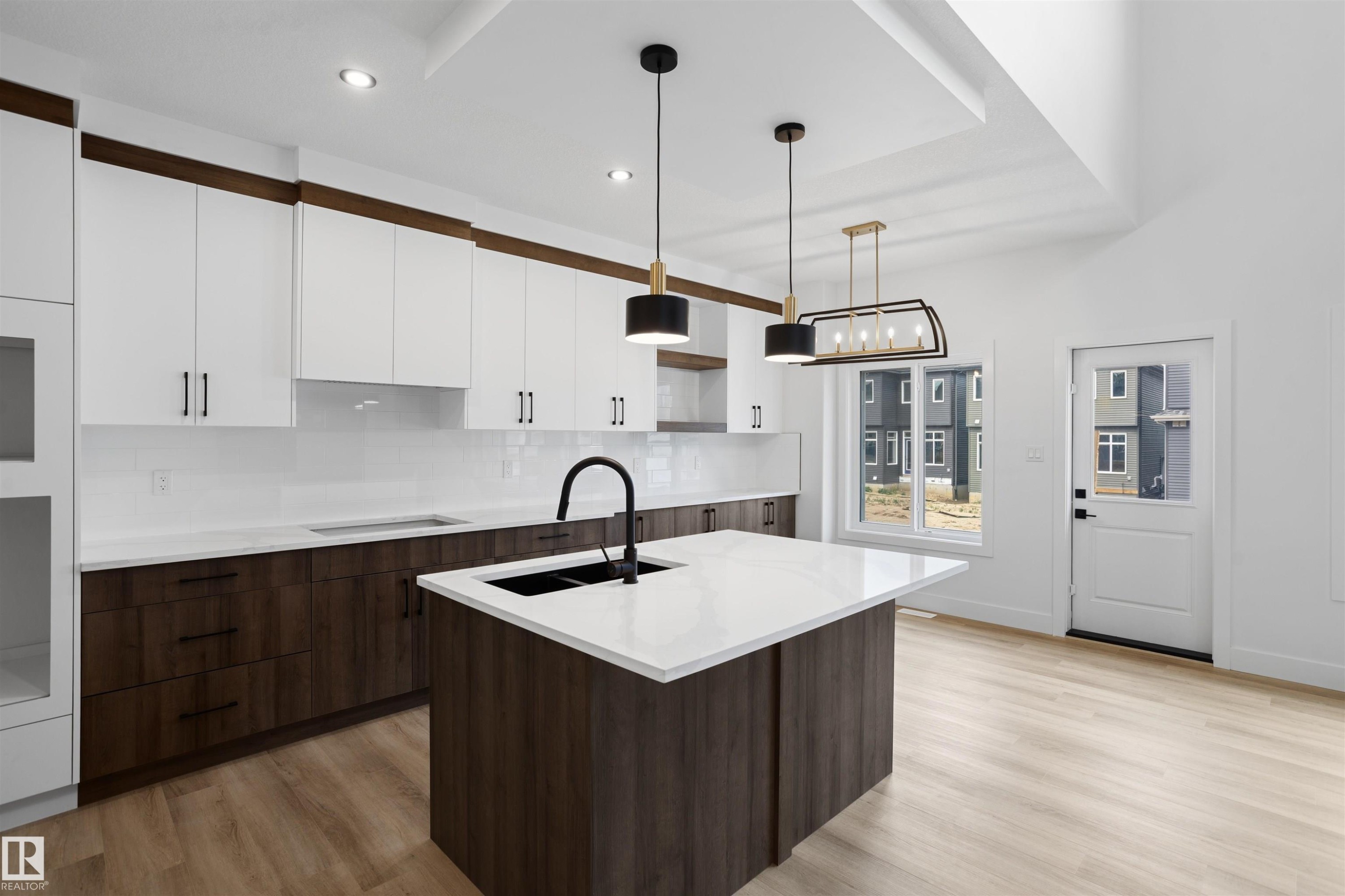 1772 Crossbill Loop Nw, Edmonton, AB - Indoor Photo Showing Kitchen With Double Sink With Upgraded Kitchen
