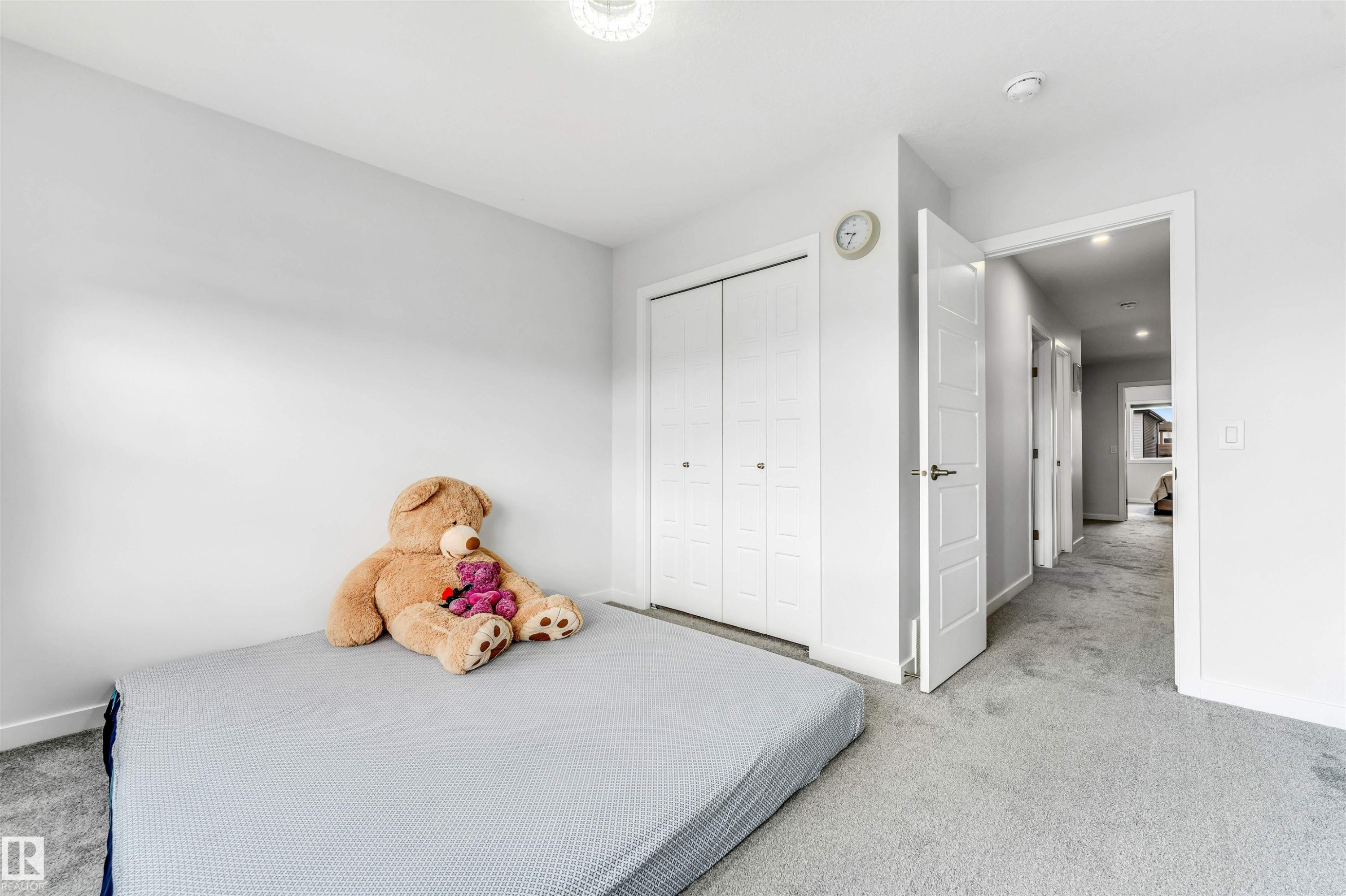 Neutral tone bedroom with light gray walls and plush gray carpeting - 425 41 Street, Edmonton, AB - Indoor Photo Showing Bedroom