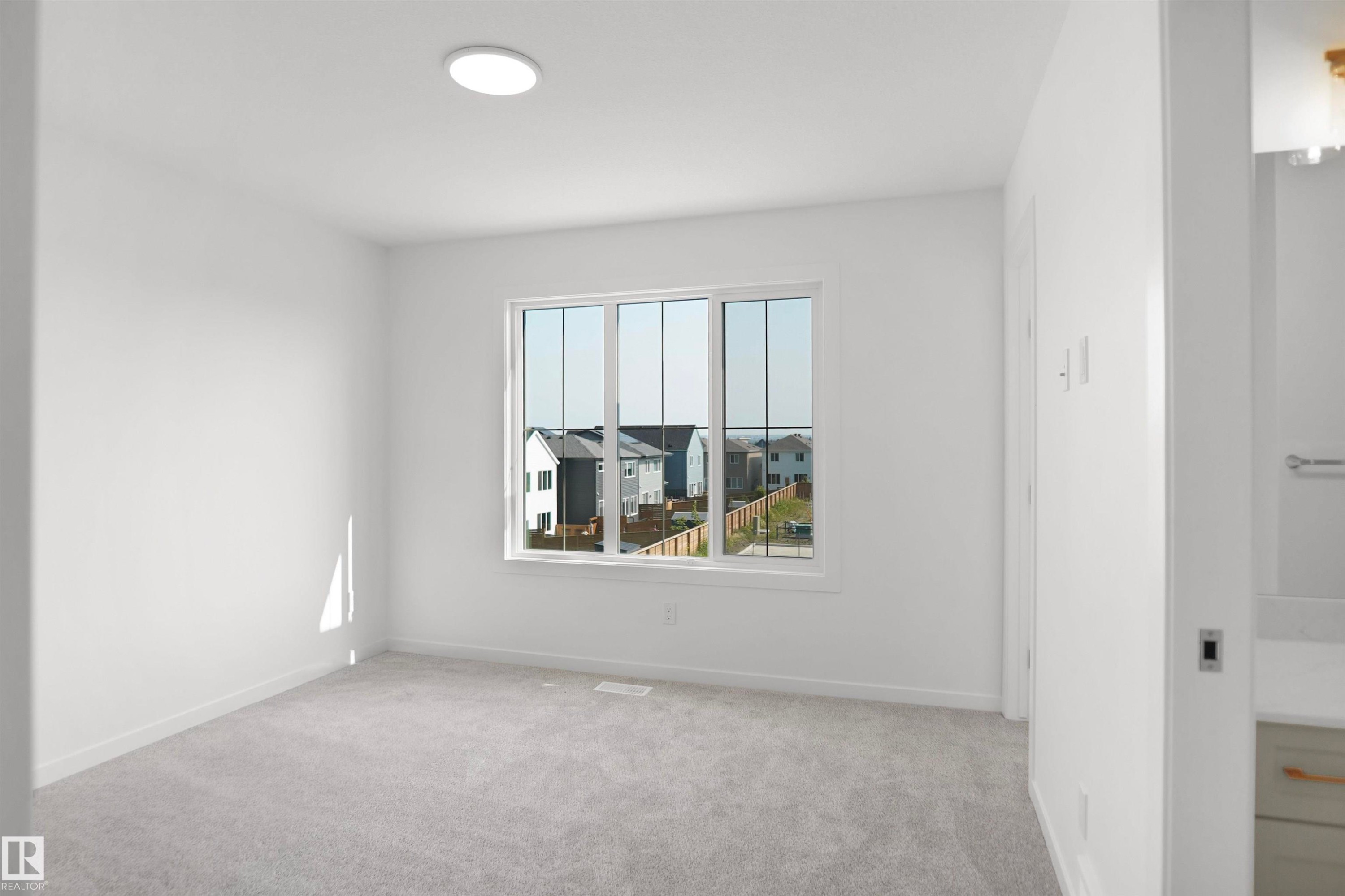 #62 17319 5 St Ne, Edmonton, AB - Indoor Photo Showing Other Room