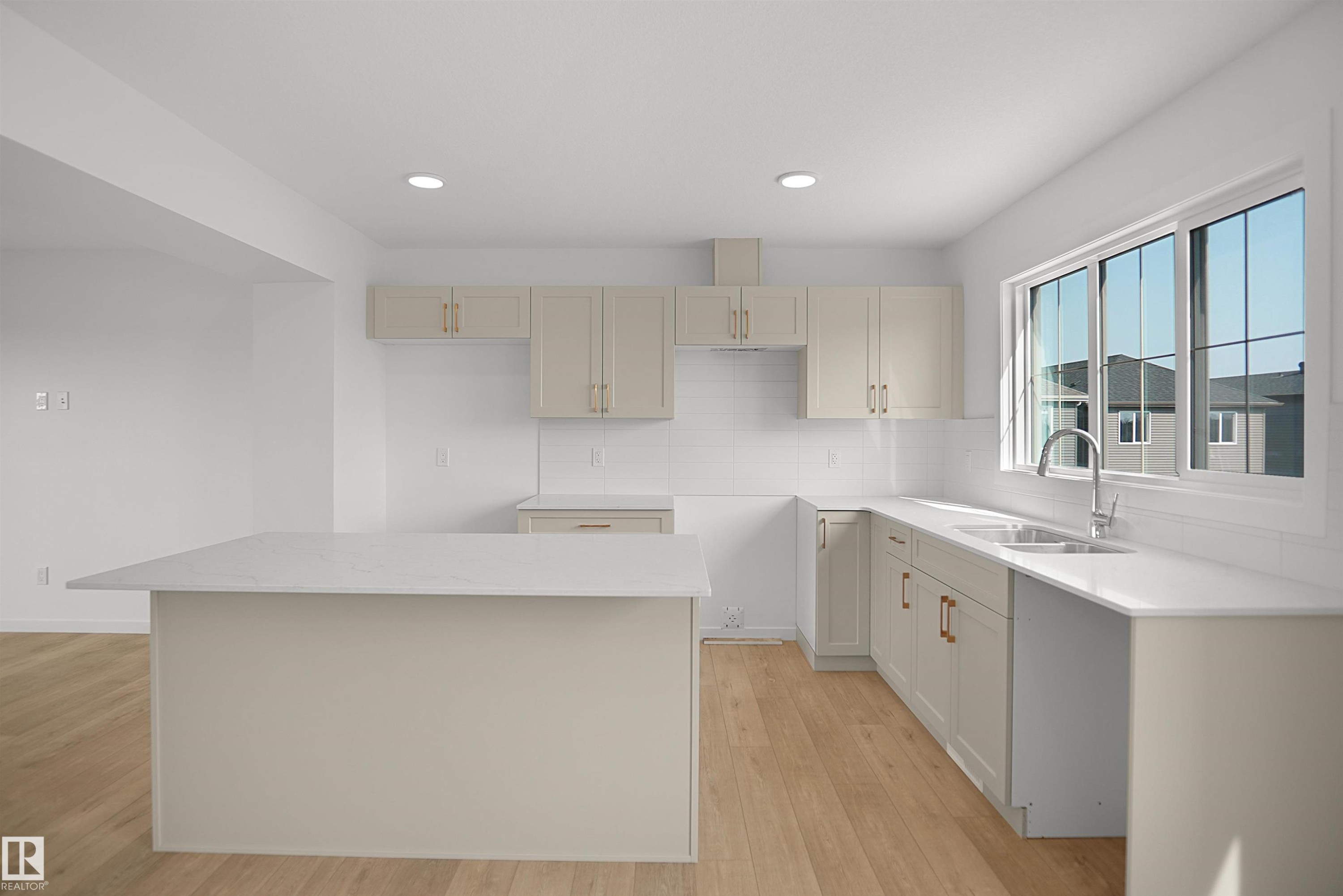 #62 17319 5 St Ne, Edmonton, AB - Indoor Photo Showing Kitchen With Double Sink