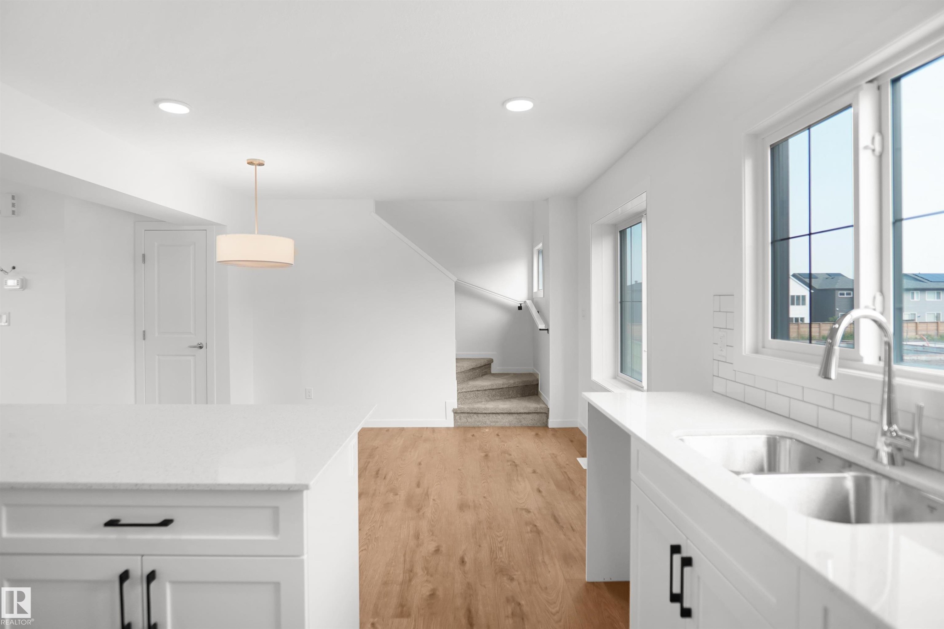 #67 17319 5 St Ne, Edmonton, AB - Indoor Photo Showing Kitchen With Double Sink