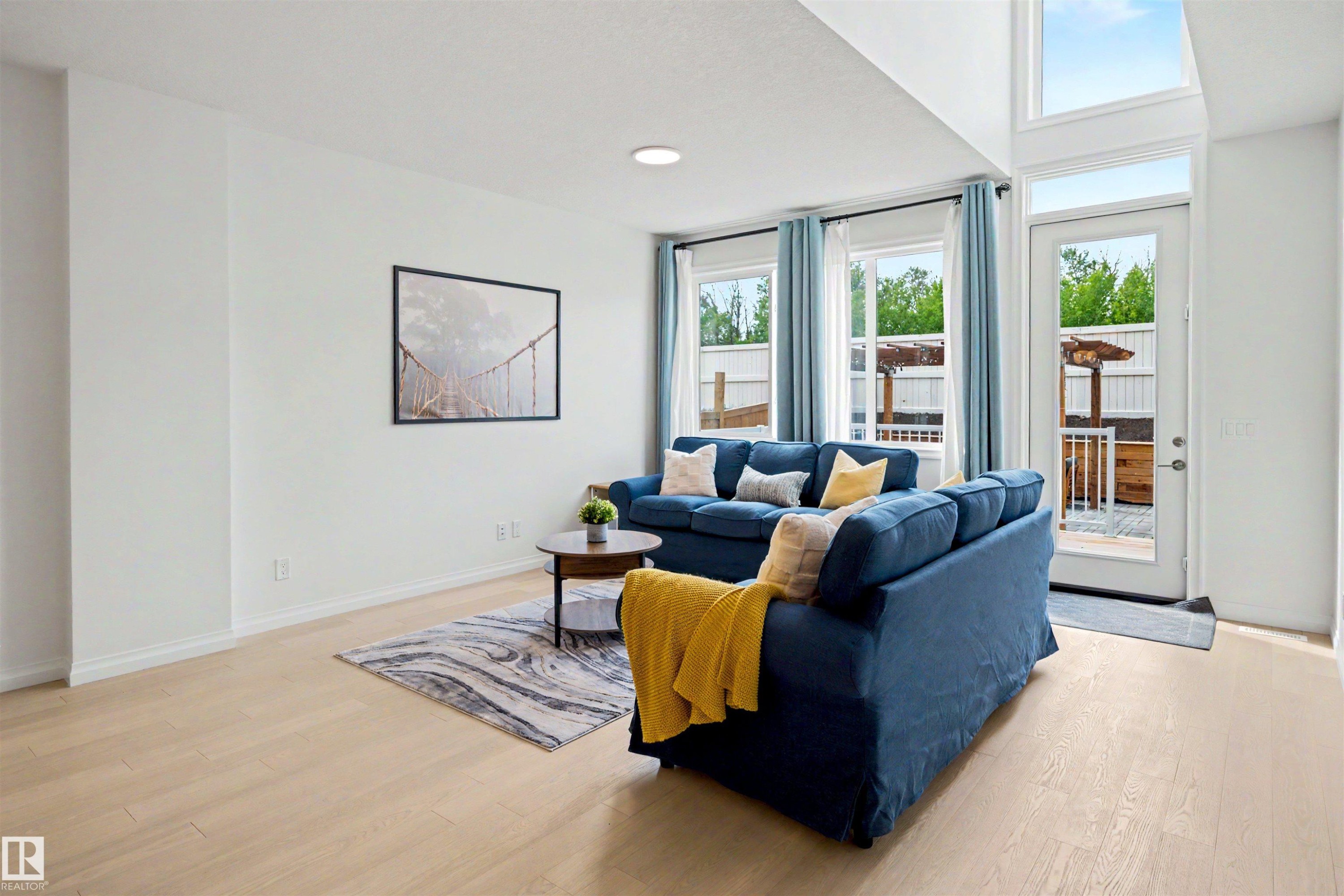 155 Stonehouse Way, Leduc, AB - Indoor Photo Showing Living Room