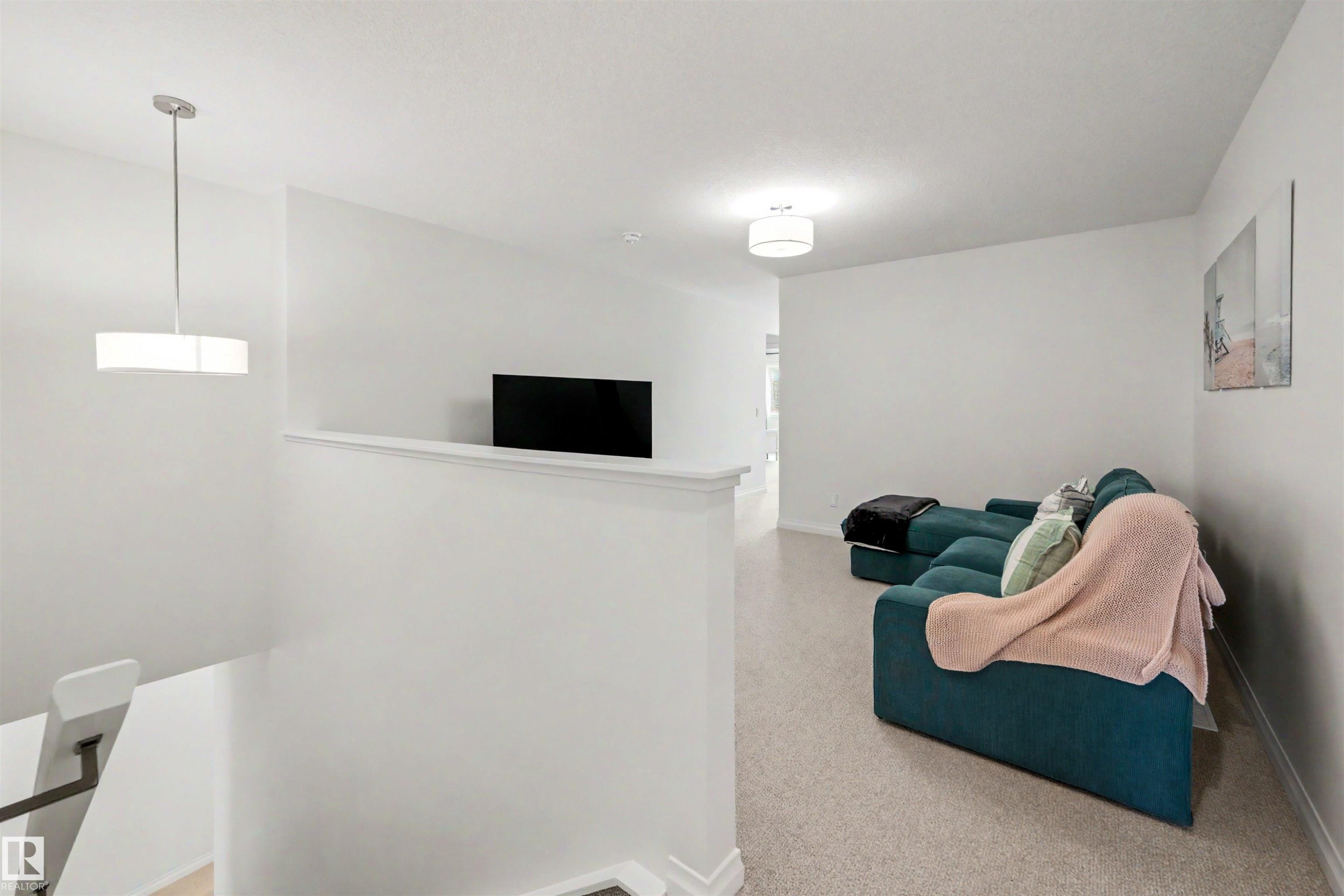 155 Stonehouse Way, Leduc, AB - Indoor Photo Showing Other Room