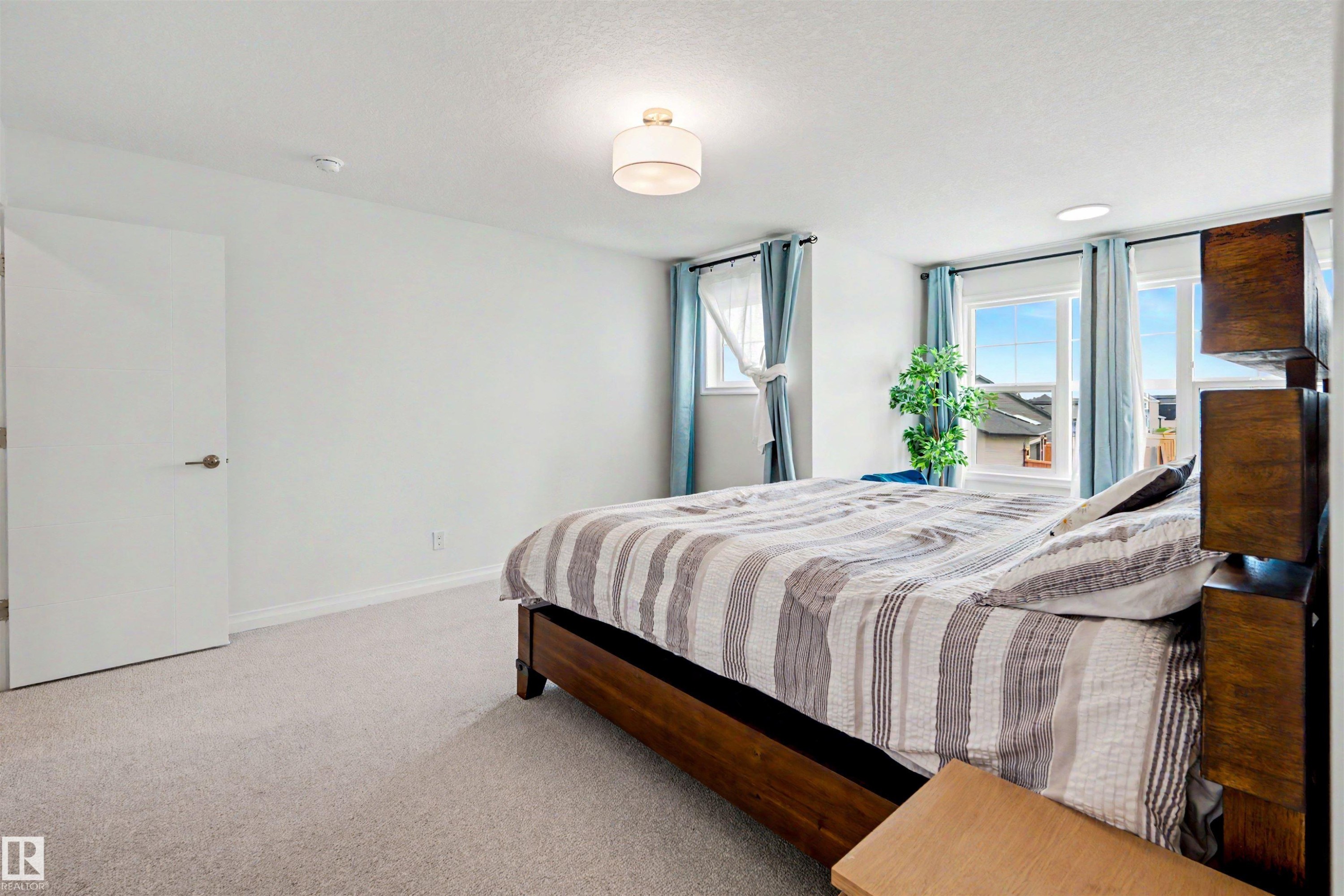 155 Stonehouse Way, Leduc, AB - Indoor Photo Showing Bedroom