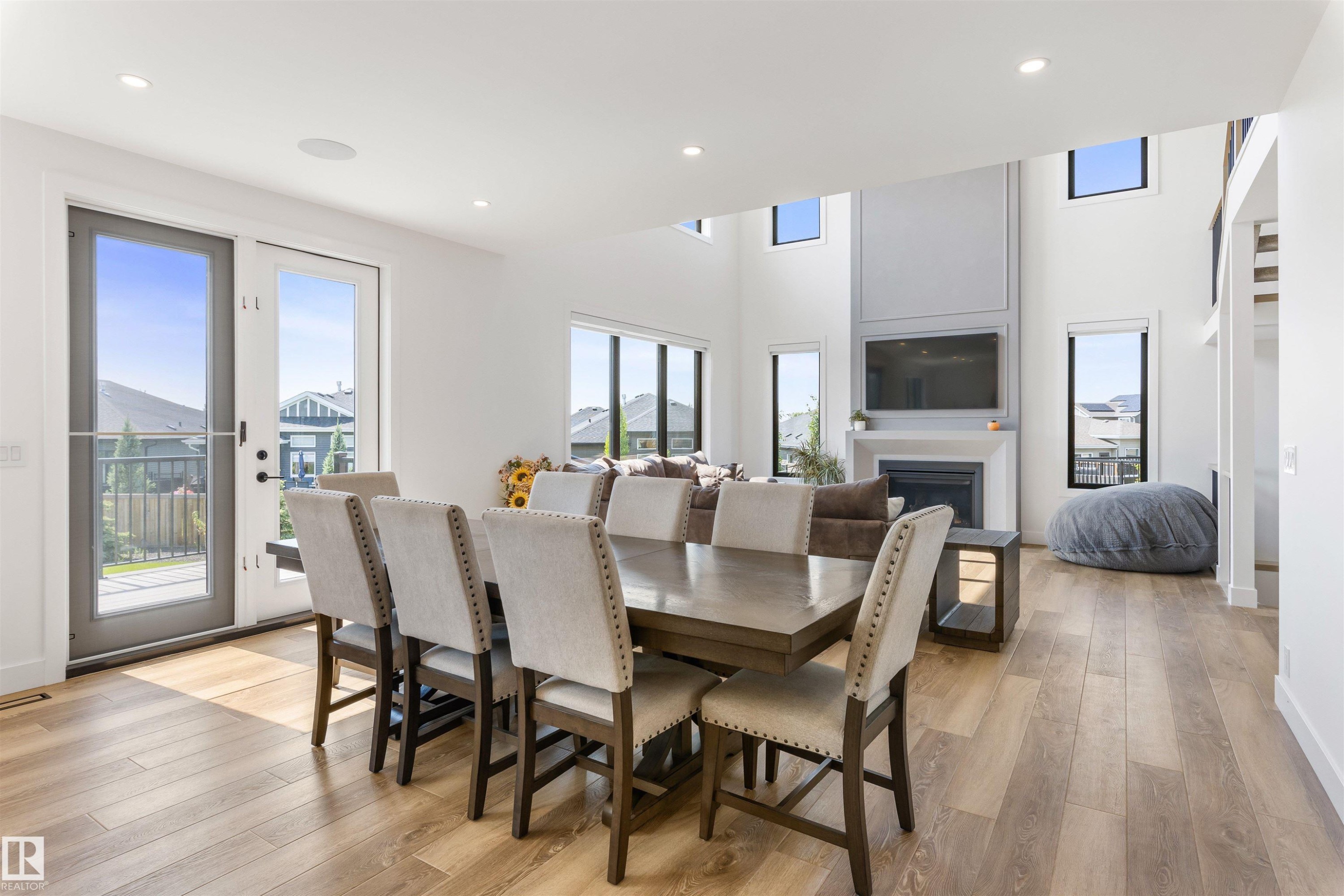 6 Harrow Close, Ardrossan, AB - Indoor Photo Showing Dining Room With Fireplace