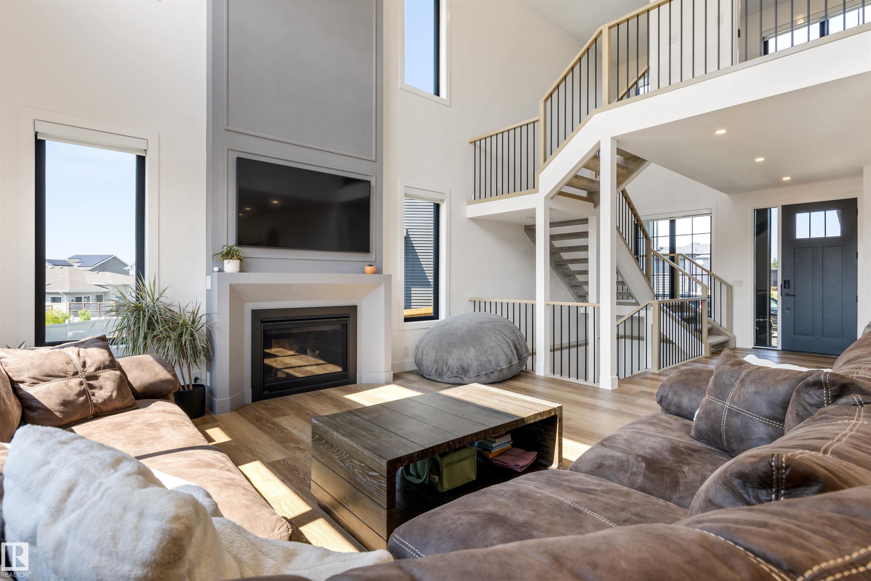 6 Harrow Close, Ardrossan, AB - Indoor Photo Showing Living Room With Fireplace