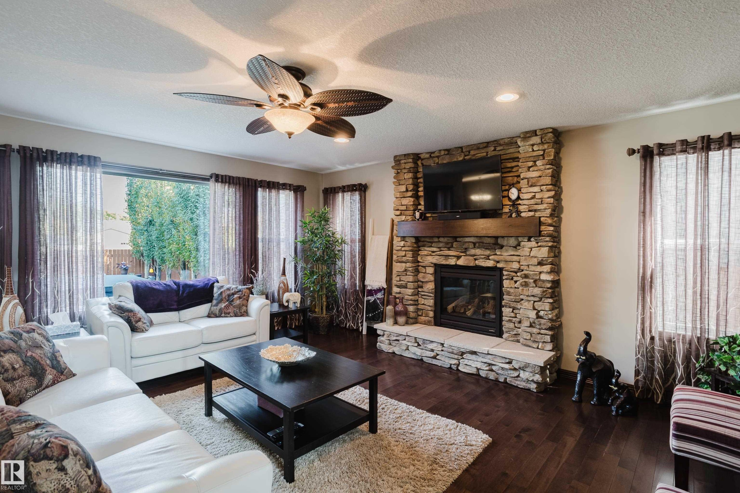 9729 159 Street Nw, Edmonton, AB - Indoor Photo Showing Living Room With Fireplace