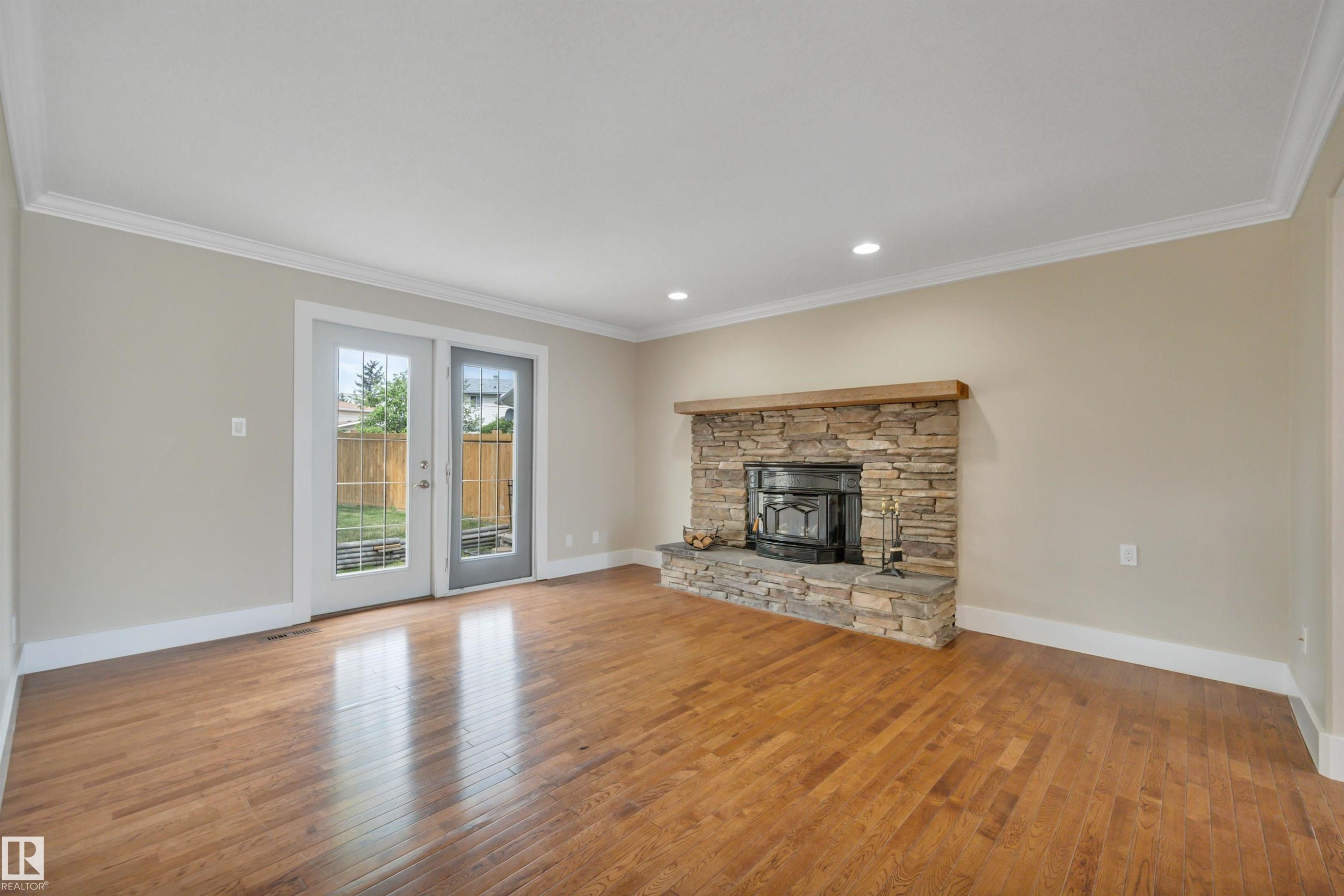 2412 112A Street, Edmonton, AB - Indoor Photo Showing Living Room With Fireplace