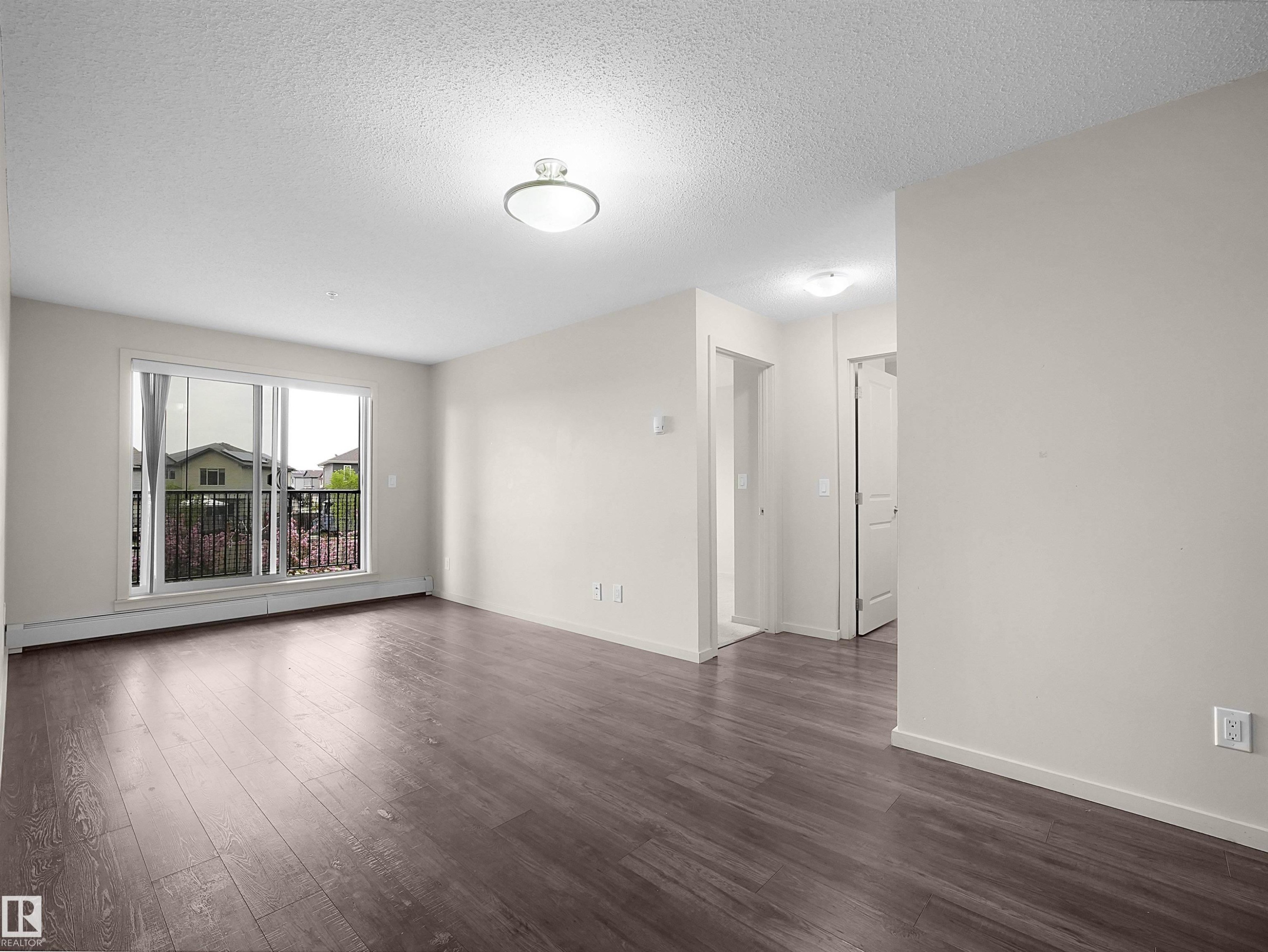 215 3357 16A Avenue, Edmonton, AB - Indoor Photo Showing Living Room