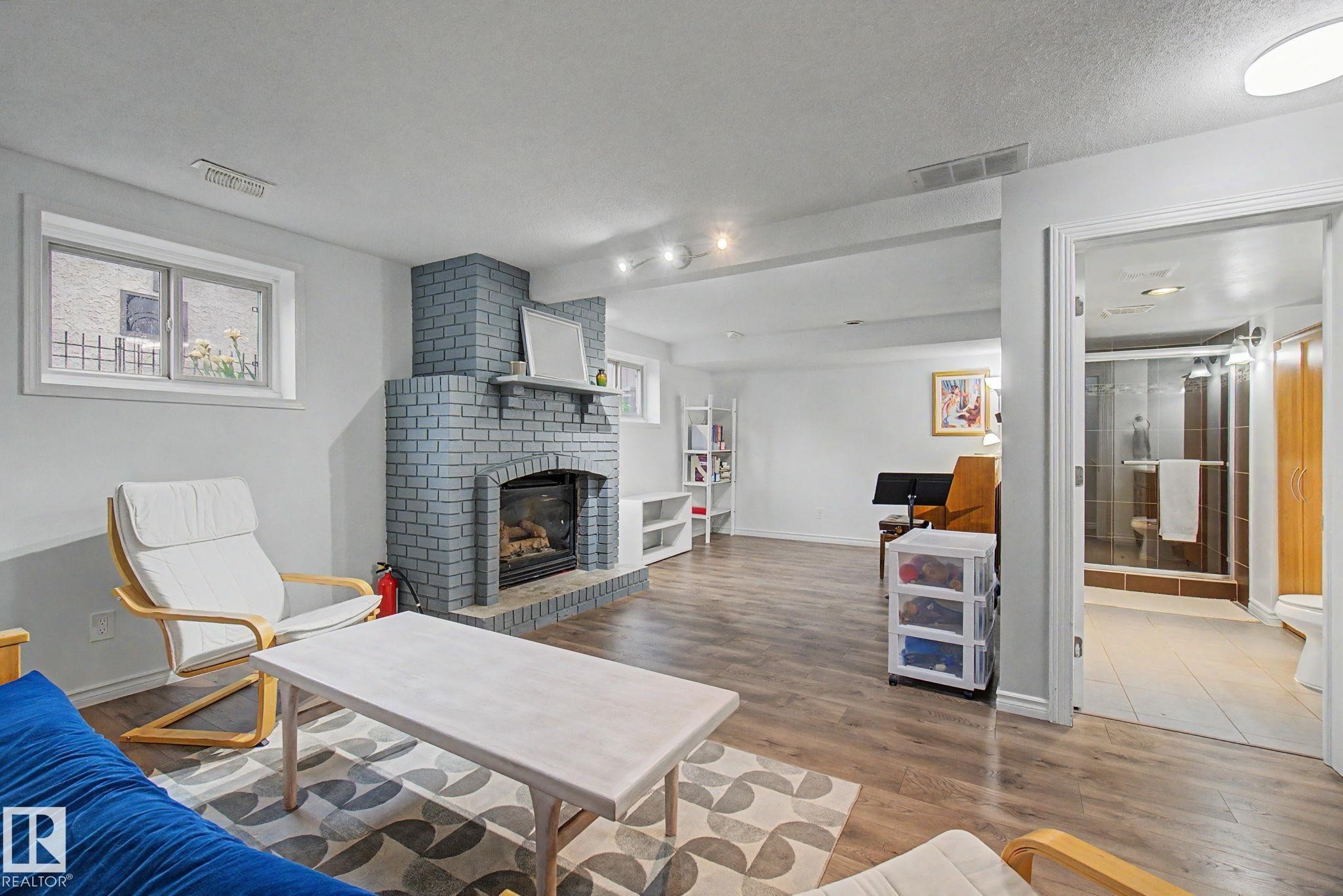 3706 41 Avenue Nw, Edmonton, AB - Indoor Photo Showing Living Room With Fireplace