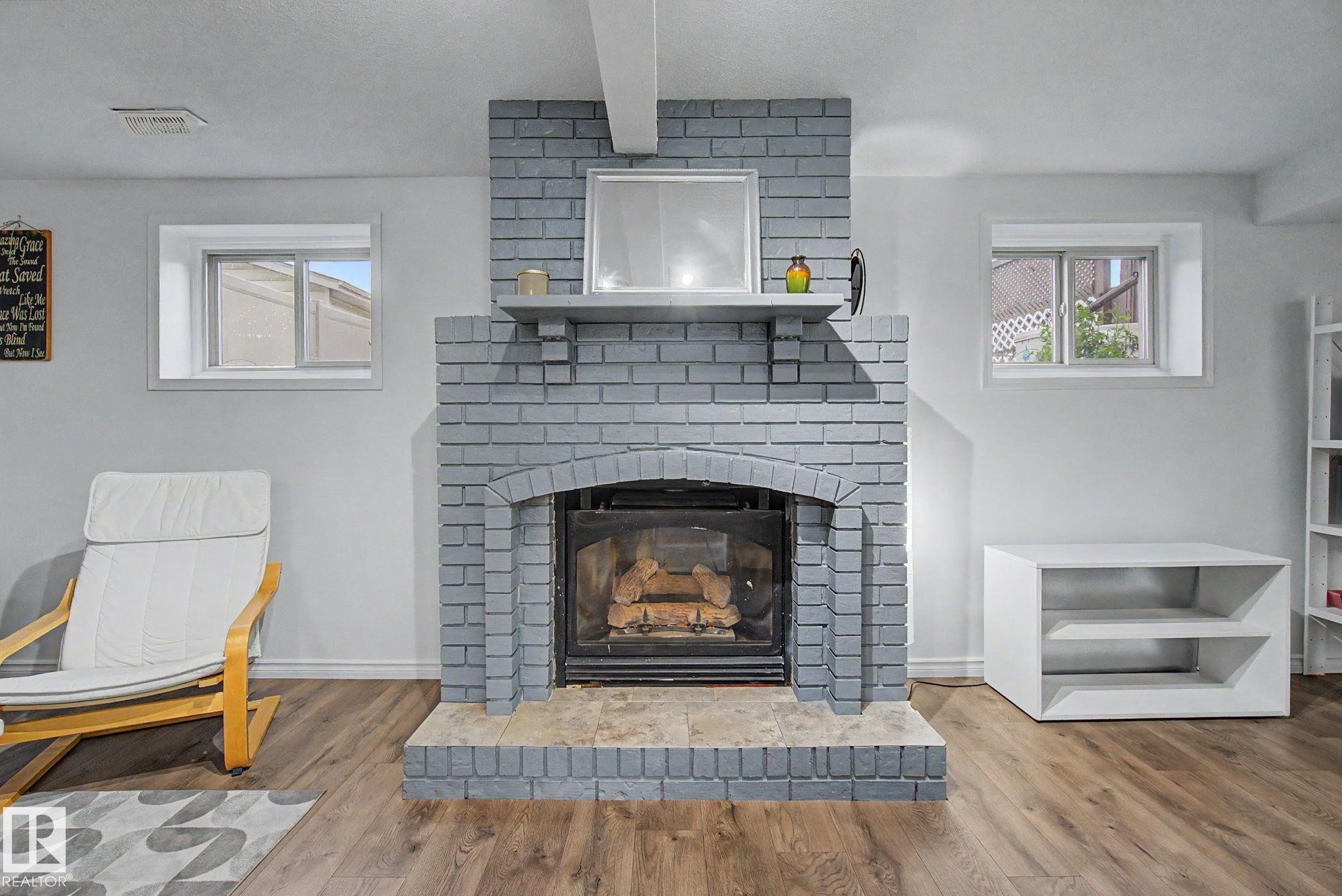 3706 41 Avenue Nw, Edmonton, AB - Indoor Photo Showing Living Room With Fireplace