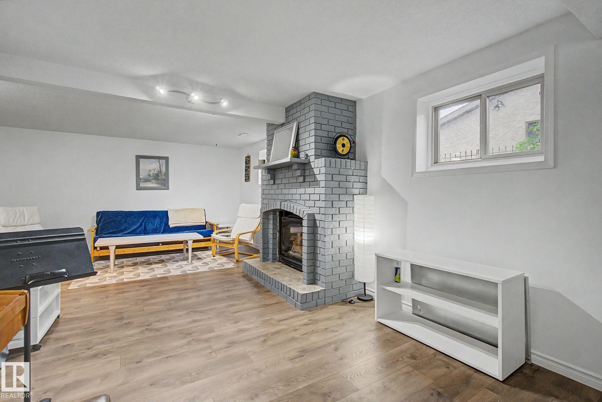 3706 41 Avenue Nw, Edmonton, AB - Indoor Photo Showing Living Room With Fireplace