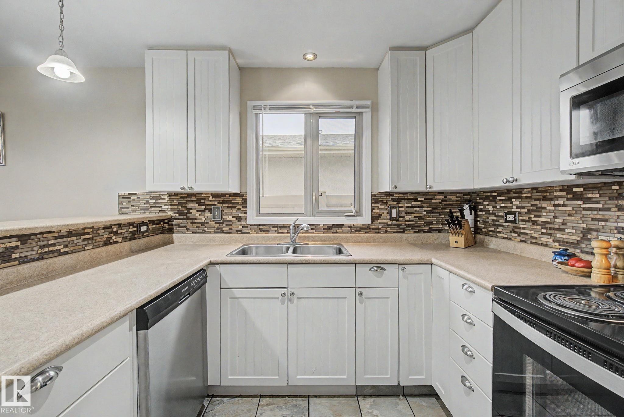3706 41 Avenue Nw, Edmonton, AB - Indoor Photo Showing Kitchen With Double Sink