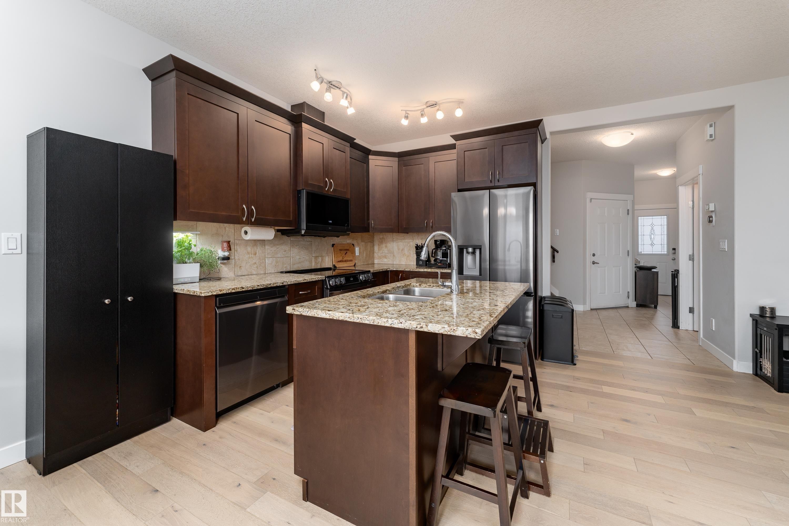 16805 55 Street Nw, Edmonton, AB - Indoor Photo Showing Kitchen With Double Sink With Upgraded Kitchen