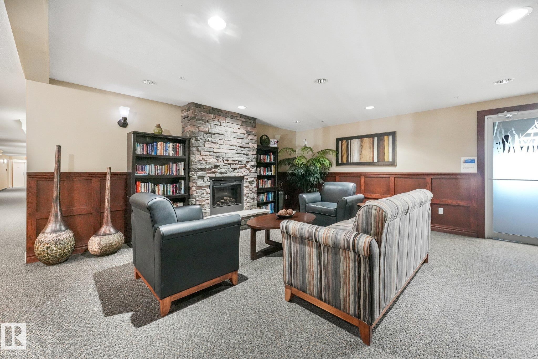 #209 1589 Glastonbury Bv Nw, Edmonton, AB - Indoor With Fireplace