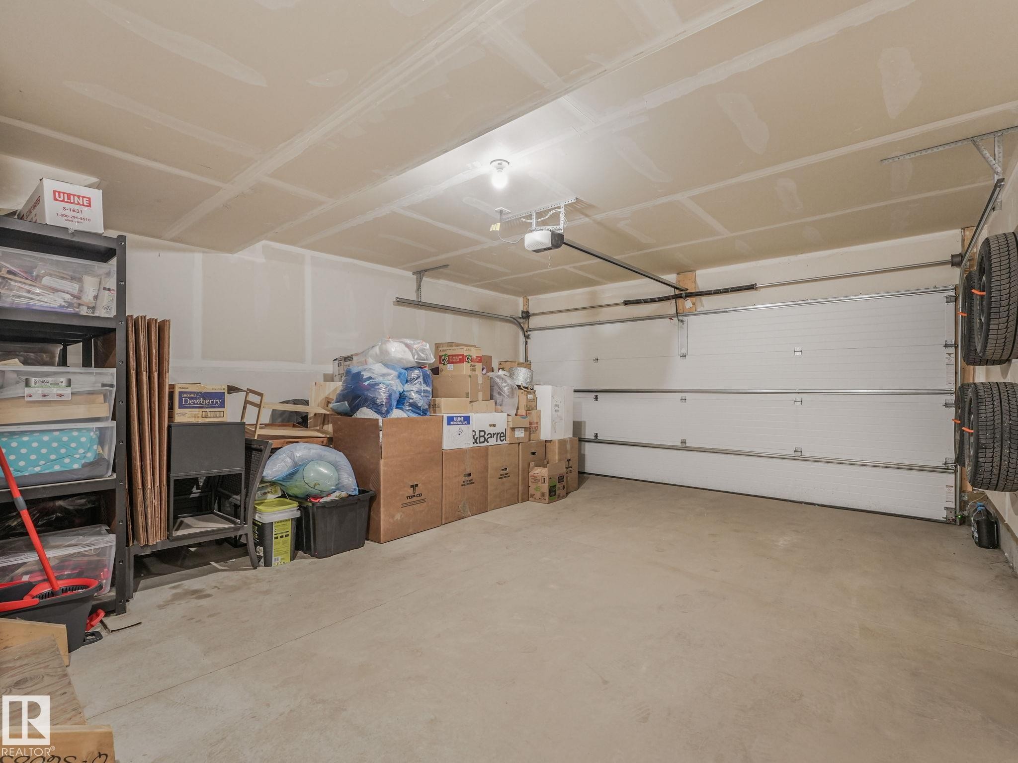 1061 Cy Becker Road Nw, Edmonton, AB - Indoor Photo Showing Garage