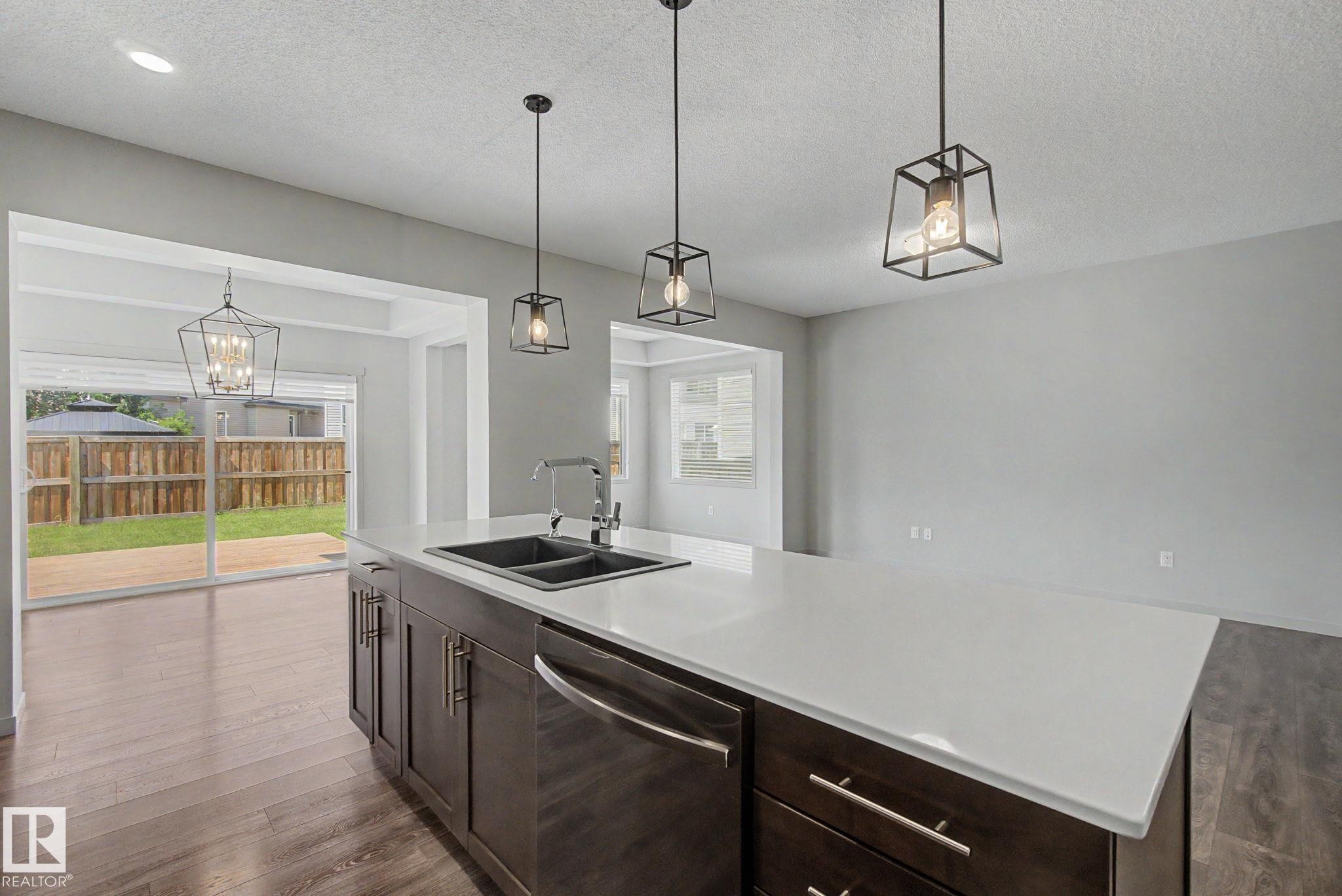 4675 Alwood Way Sw, Edmonton, AB - Indoor Photo Showing Kitchen With Double Sink