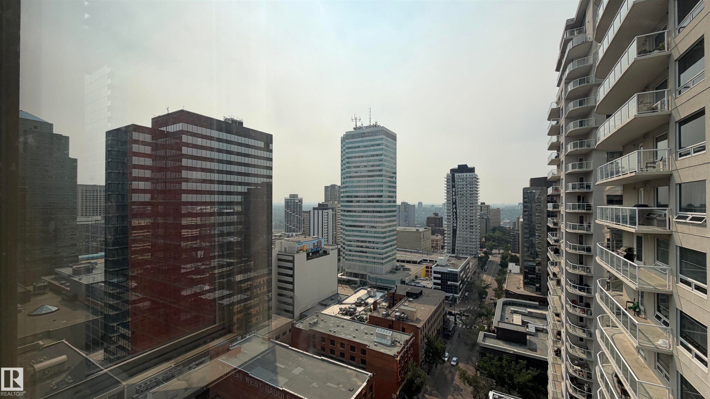 Expansive urban landscape featuring multiple high-rise buildings and city streets - #2401 10180 104 St Nw, Edmonton, AB - Outdoor