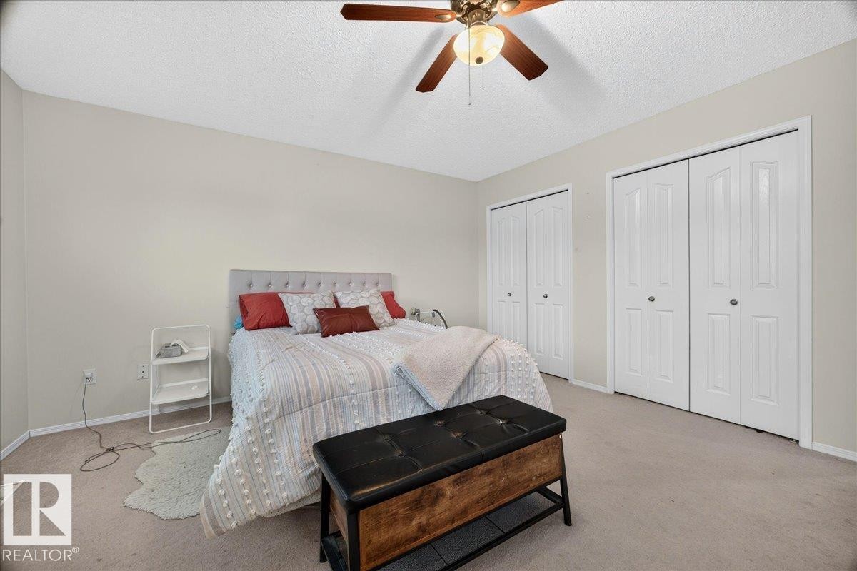 Bedroom with light-colored carpeting and neutral painted walls - 6 Norfolk Close, St. Albert, AB - Indoor Photo Showing Bedroom