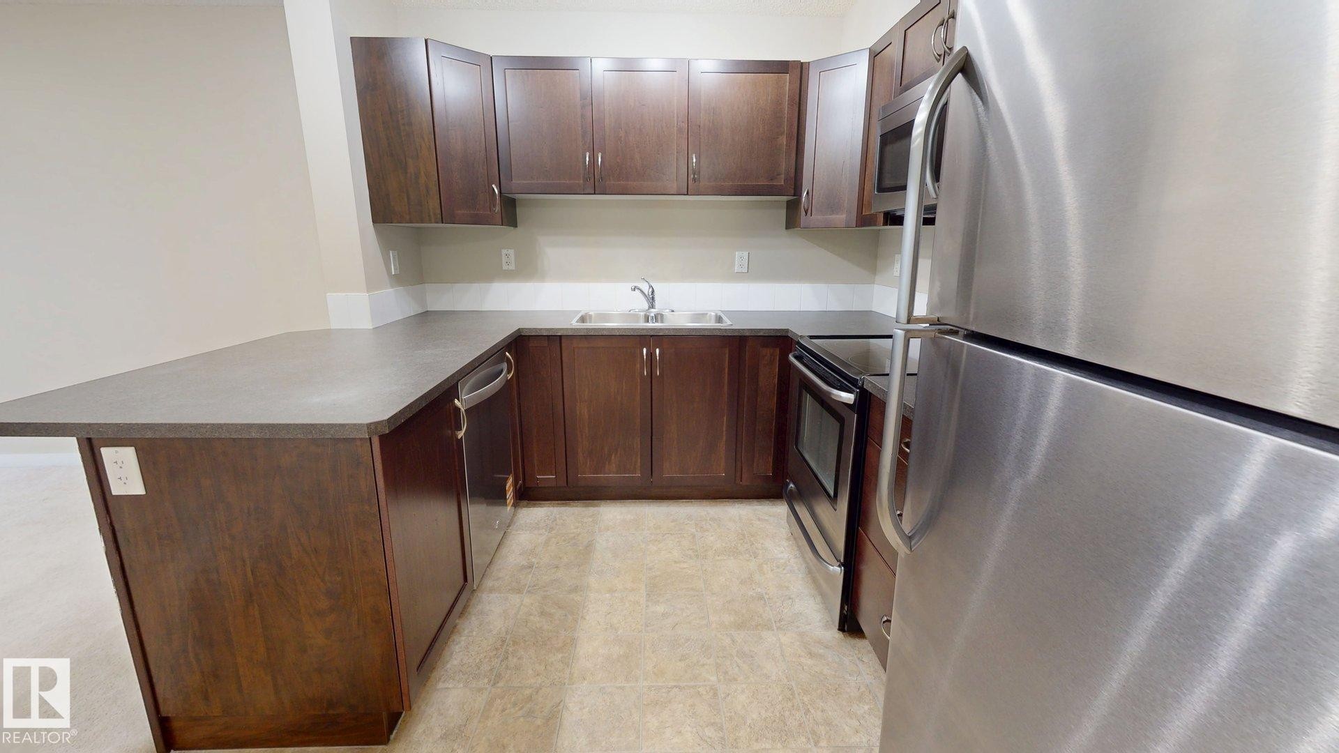 #213 396 Silver Berry Rd Nw, Edmonton, AB - Indoor Photo Showing Kitchen