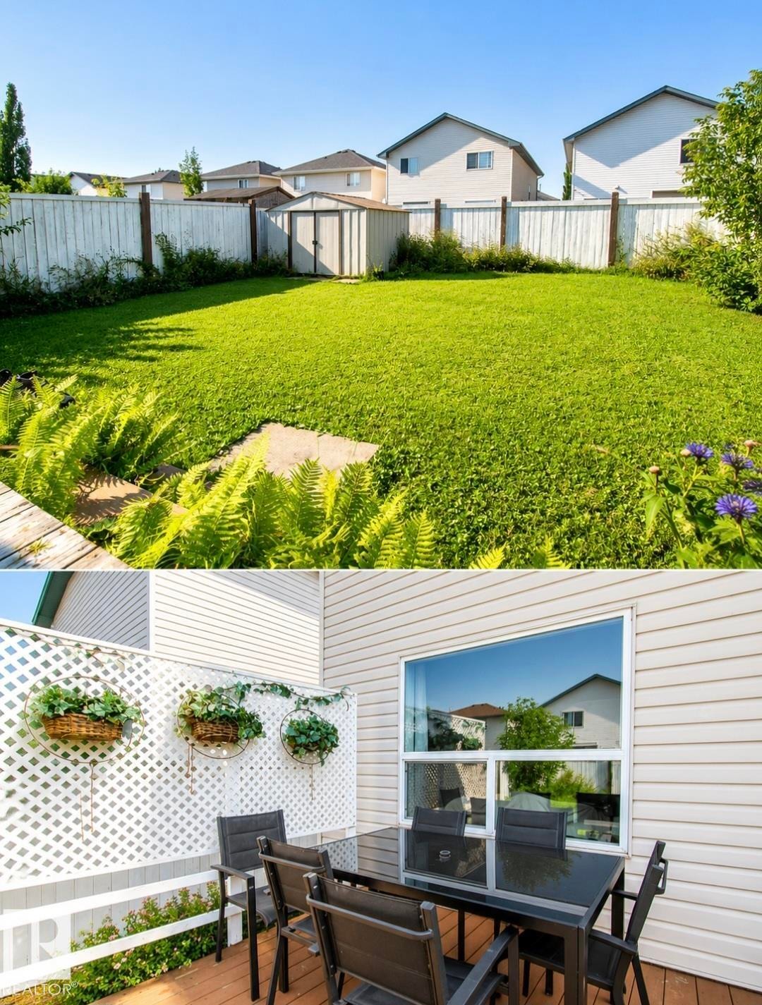 Expansive backyard featuring a manicured lawn, established perimeter fencing, and a utility shed - 3236 27 Avenue Nw, Edmonton, AB - Outdoor With Exterior