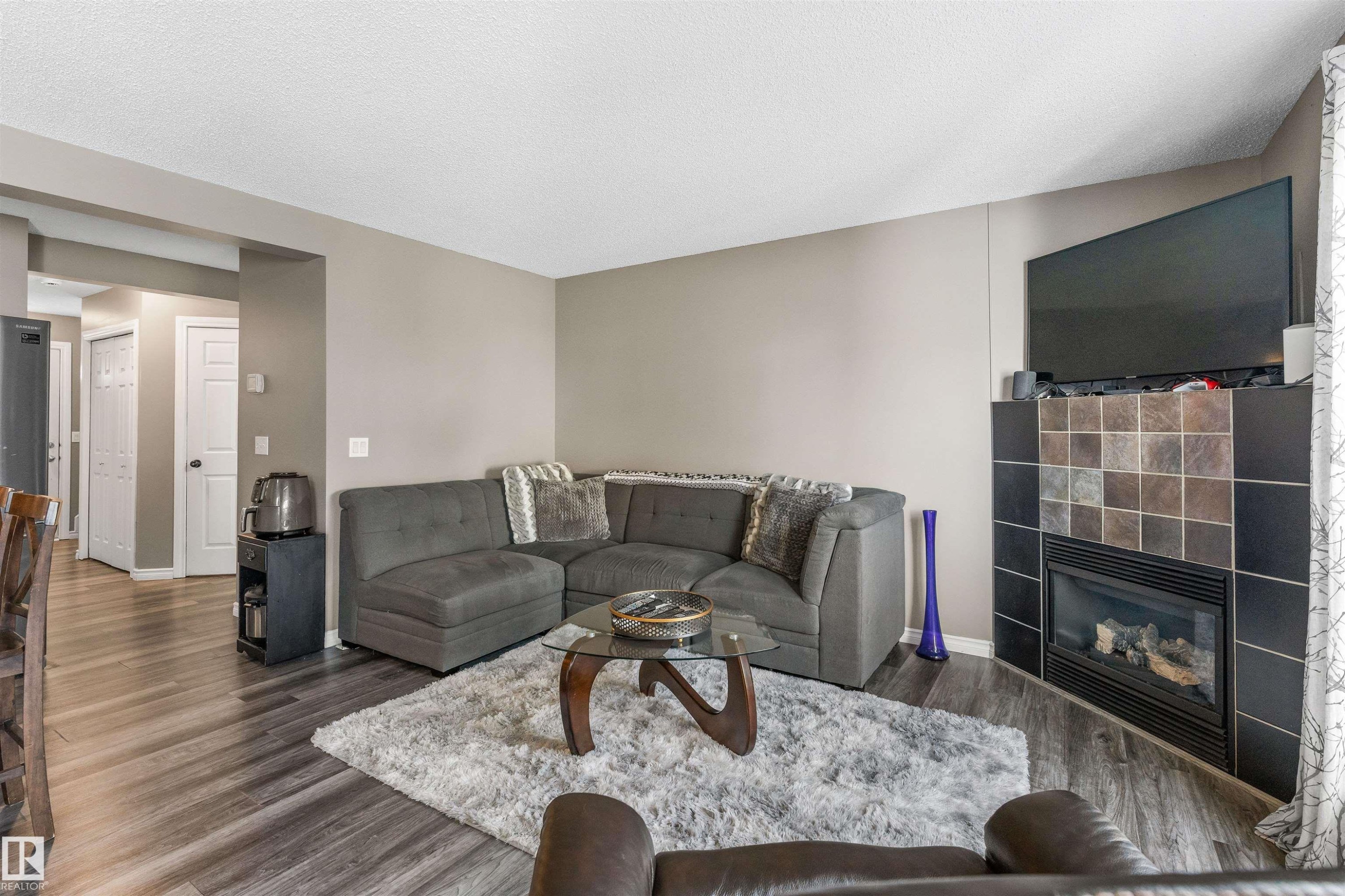 20032 53A Avenue Nw, Edmonton, AB - Indoor Photo Showing Living Room With Fireplace