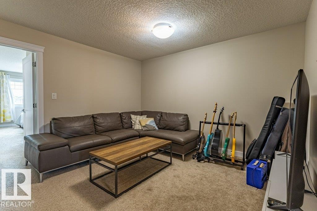 9372 Cooper Bend Sw, Edmonton, AB - Indoor Photo Showing Living Room