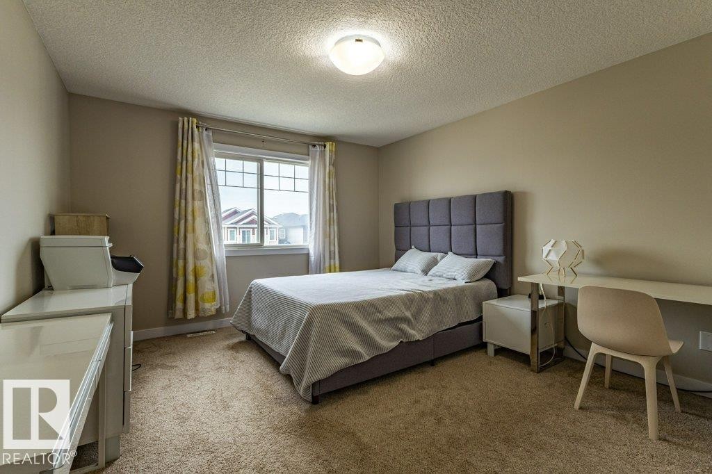 9372 Cooper Bend Sw, Edmonton, AB - Indoor Photo Showing Bedroom