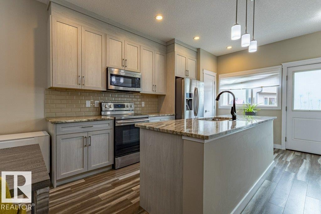 9372 Cooper Bend Sw, Edmonton, AB - Indoor Photo Showing Kitchen With Upgraded Kitchen