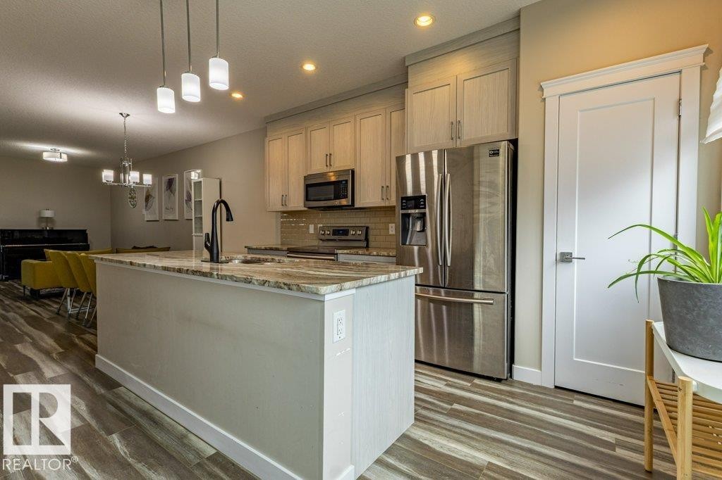 9372 Cooper Bend Sw, Edmonton, AB - Indoor Photo Showing Kitchen With Double Sink With Upgraded Kitchen