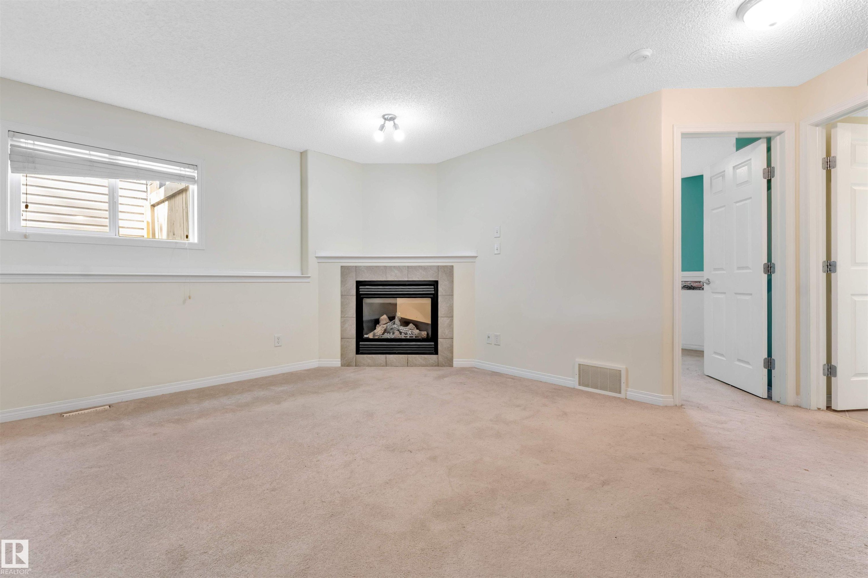 613 83 Street Sw, Edmonton, AB - Indoor With Fireplace