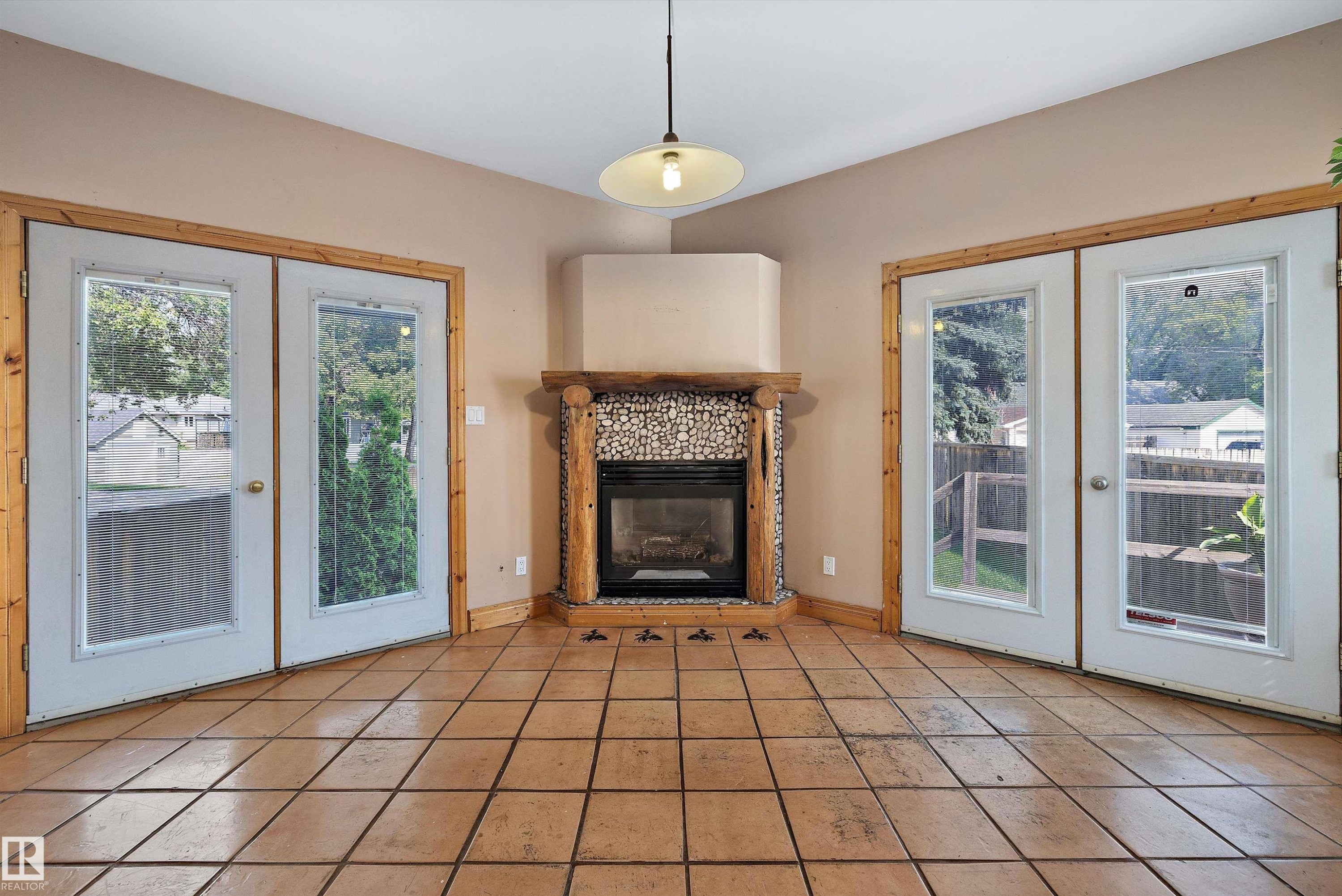 11253 89 Street Nw, Edmonton, AB - Indoor Photo Showing Living Room With Fireplace