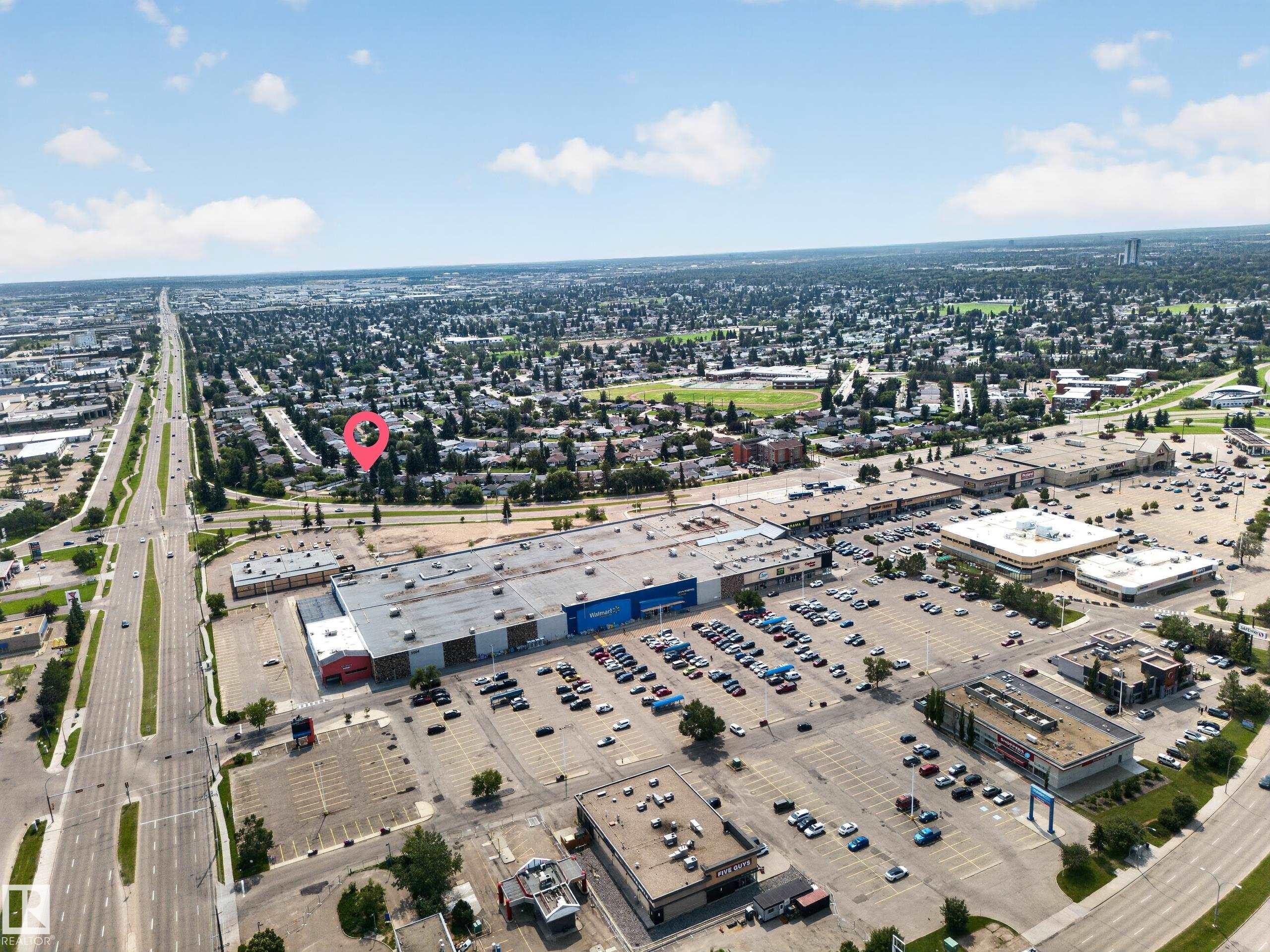 Aerial view showcasing the property's proximity to retail centers and major thoroughfares - 5204 97A Avenue Nw, Edmonton, AB - Outdoor With View